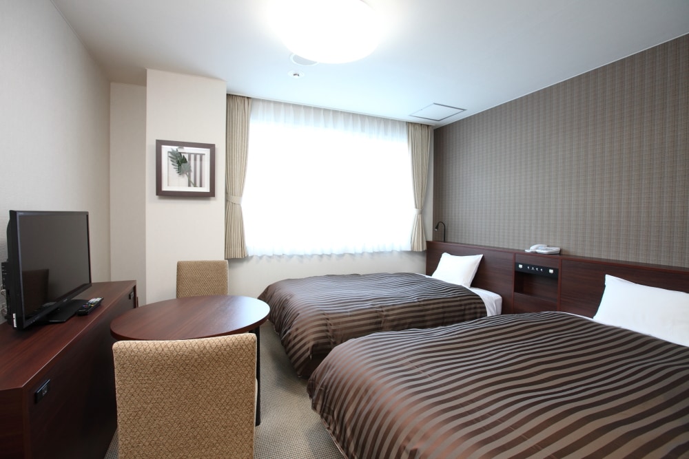 Twin room. Enjoy conversations with your spouse, friends, or loved ones during your trip.