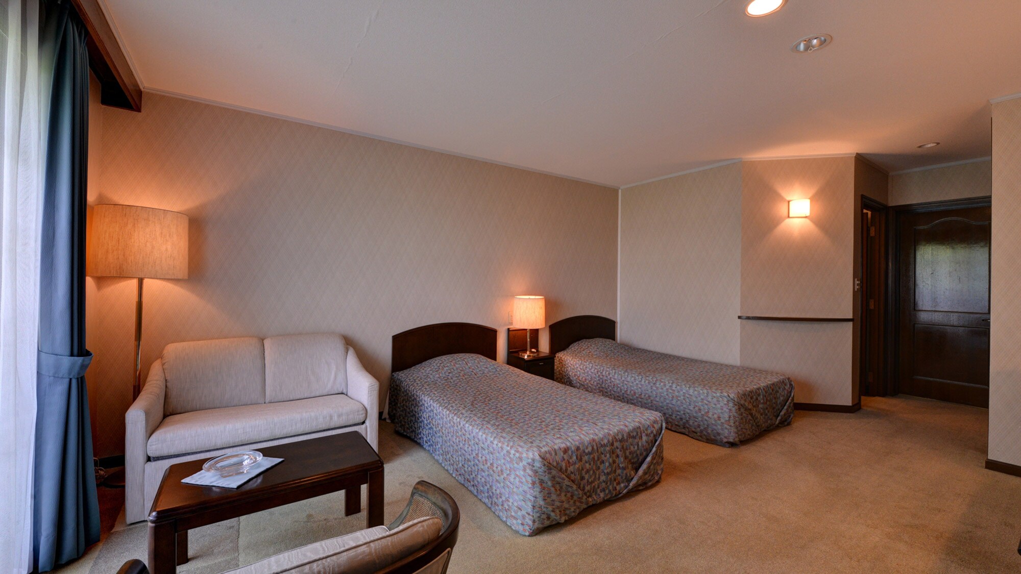 *Deluxe Twin (example of guest room)/The bed is made by Simmons. Enjoy a good night's sleep.