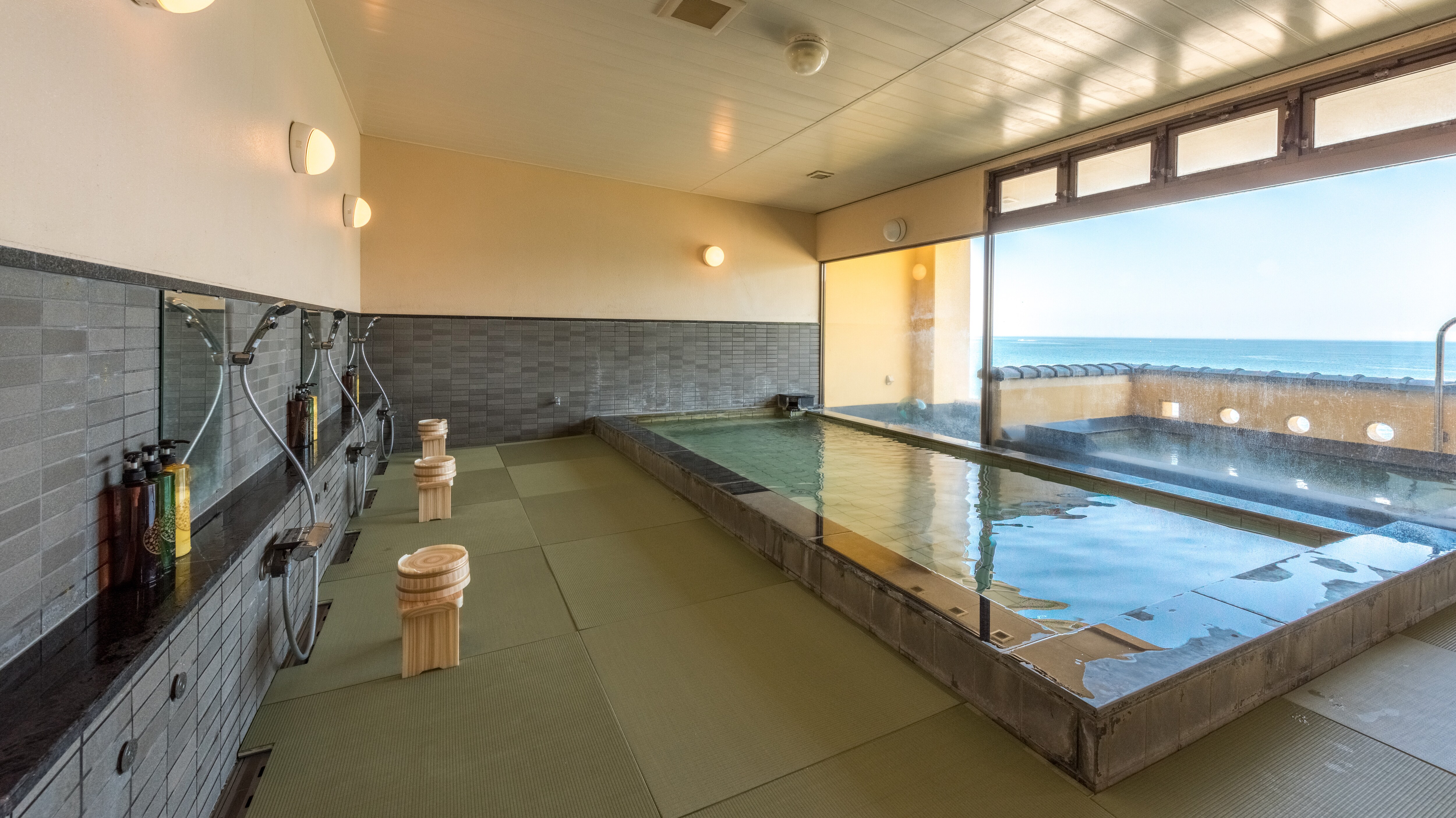 Relax in the hot springs while gazing at the ocean.