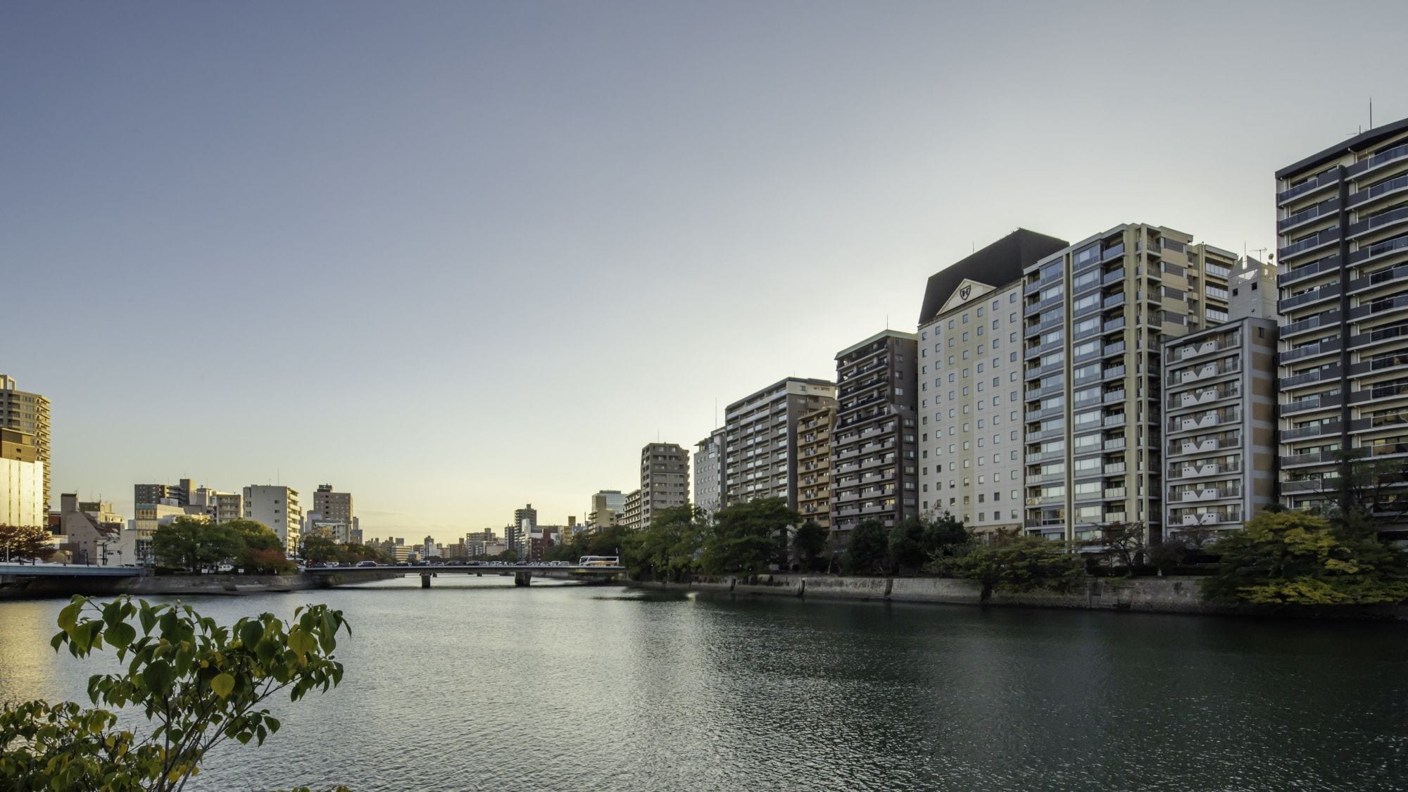 Exterior view of the hotel from the opposite bank