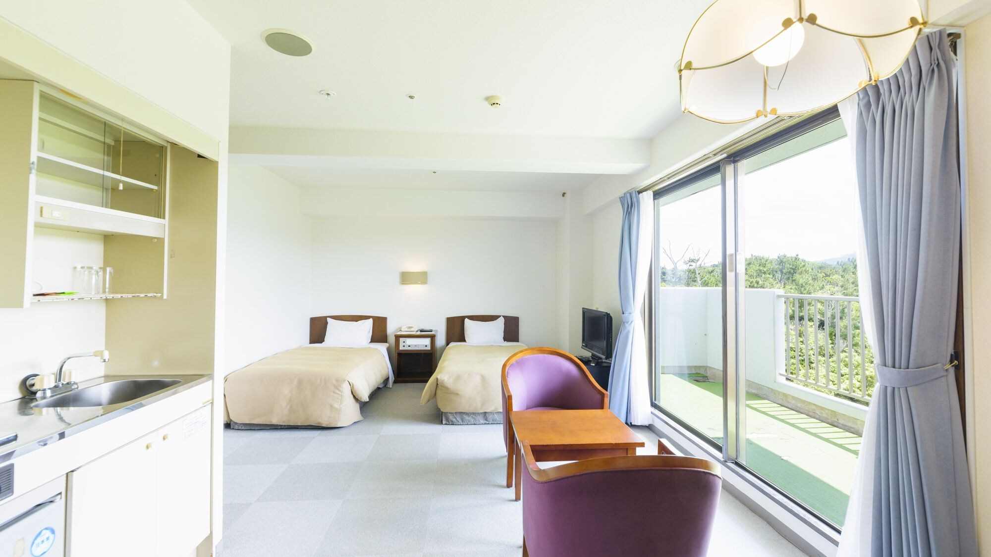 Green View Room | A cozy room overlooking the greenery.