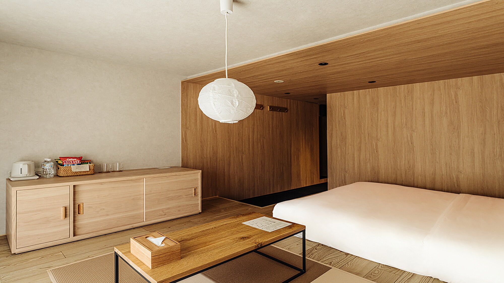 A standard double room with a comfortable, modern Japanese feel, made from natural materials.