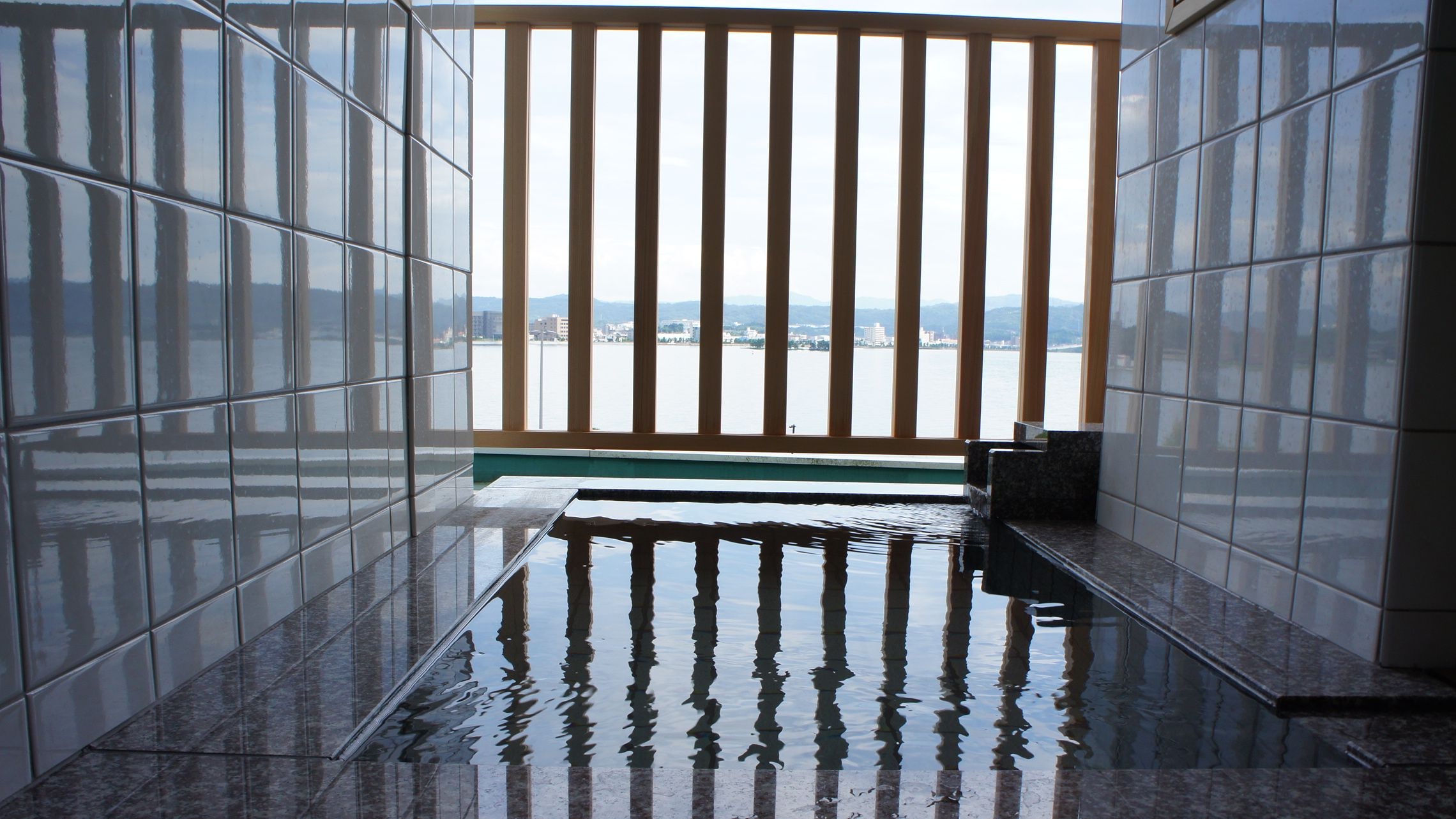Open-air hot spring bath in guest room