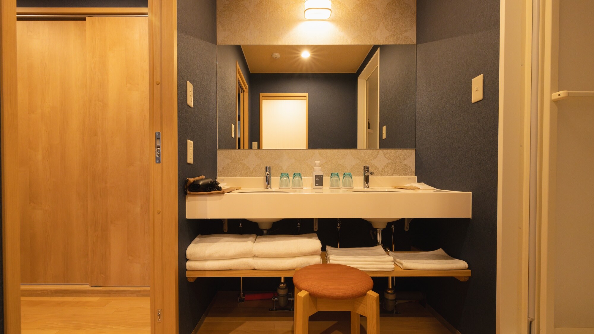 [Bunk Bedroom] The sink has a double basin, which is great for busy mornings.