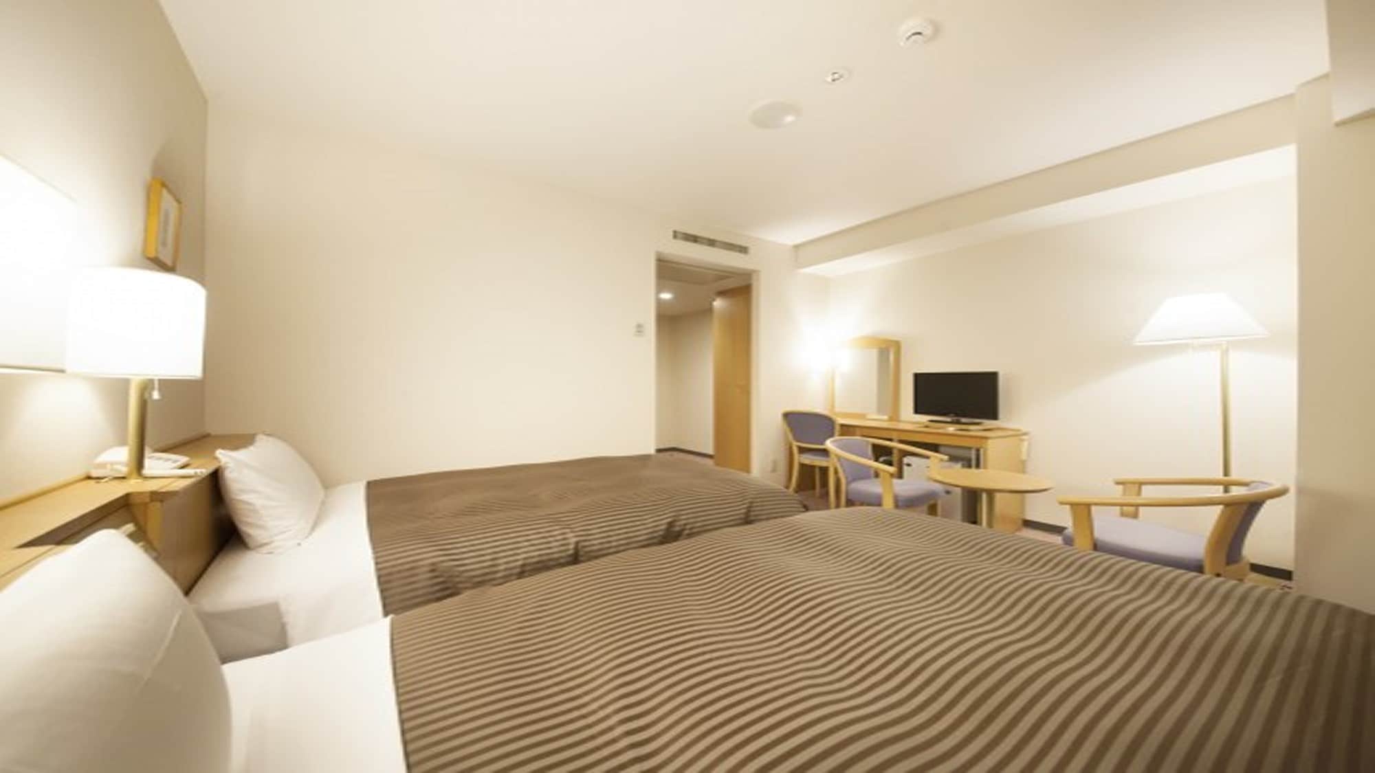 Tempat tidur kamar twin sedang