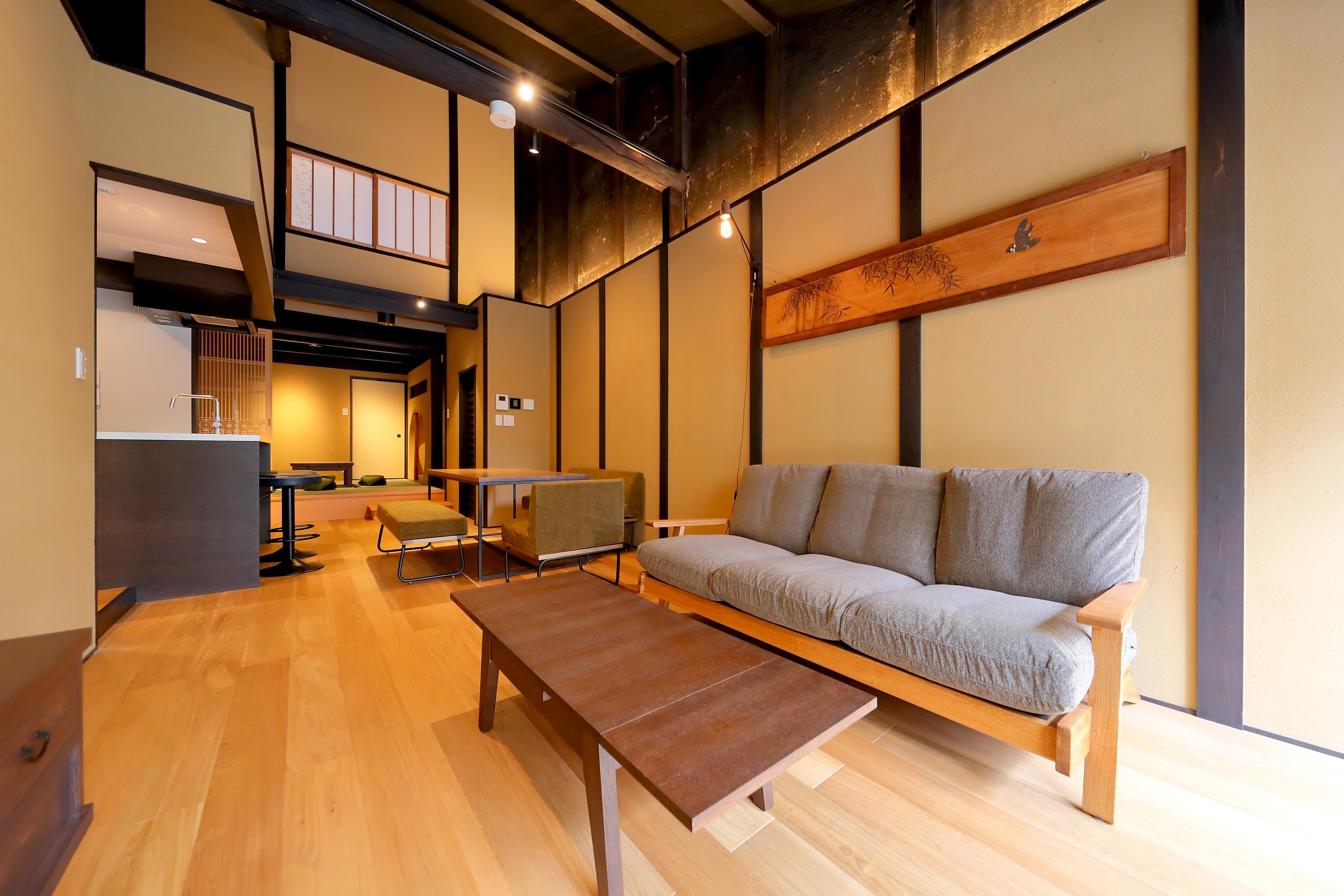 An open ceiling space that extends to the attic, unique to a traditional Kyoto townhouse