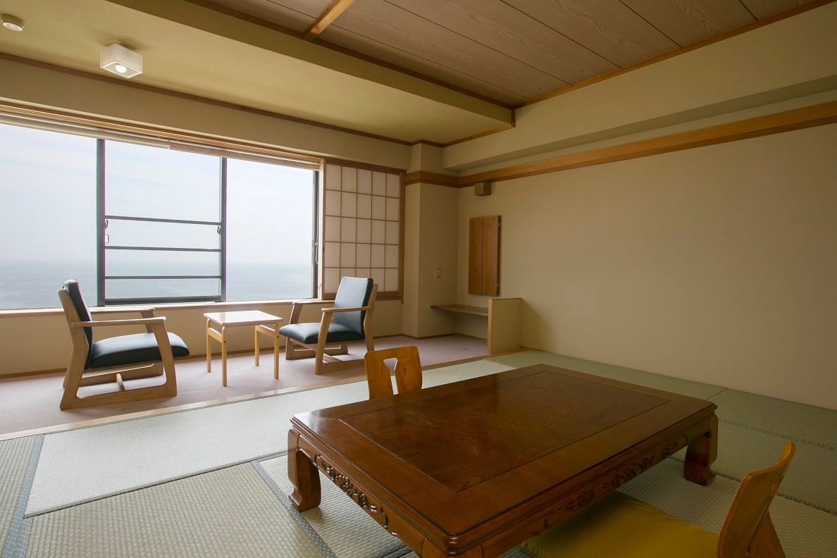 A guest room with a semi-open-air bath, 12 tatami Japanese-style room, highly rated for its "great view of the Pacific Ocean from the room"