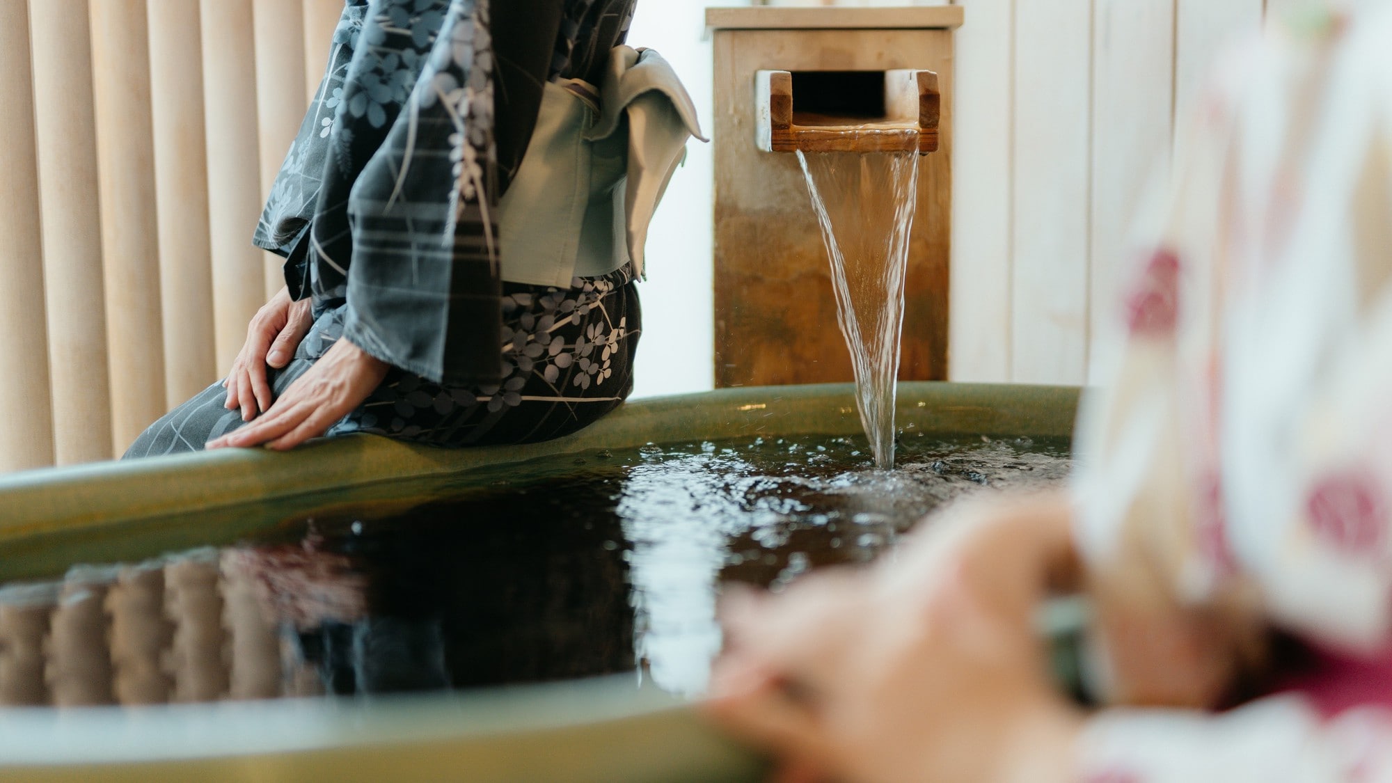 Image of a guest room with an open-air bath