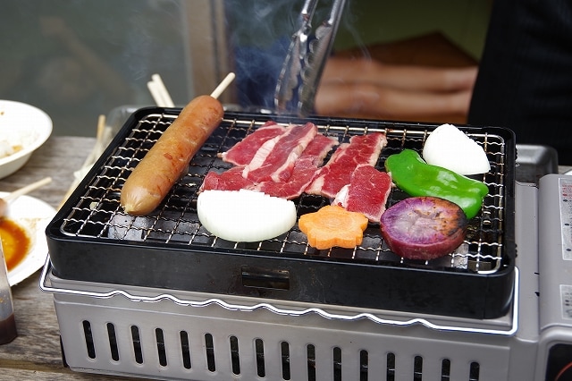 We have a gas grill that is easy to prepare. Even women can feel free to use it.