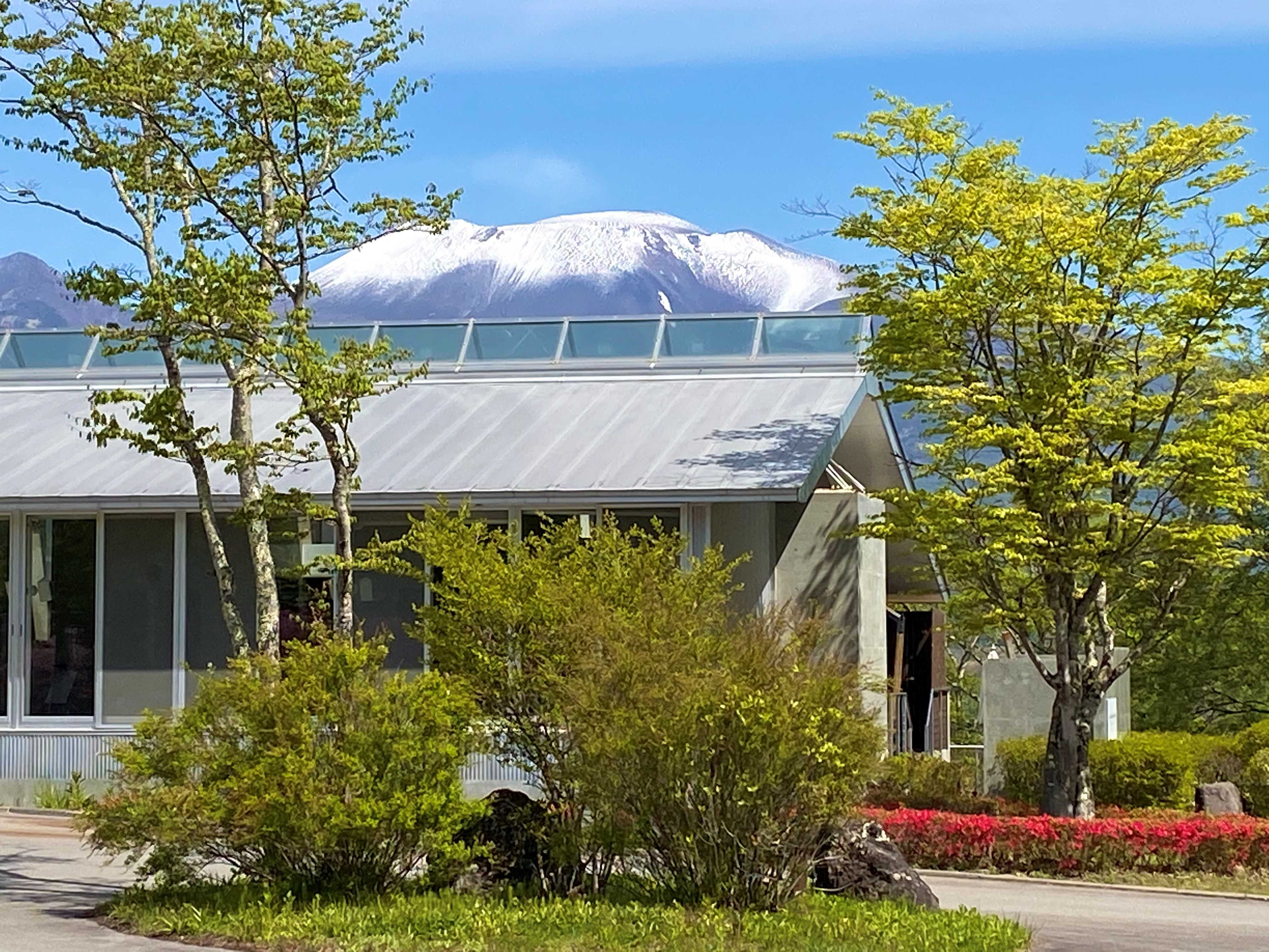 The exterior of Karuizawa Tenku Hotel, with the rental villa reception desk