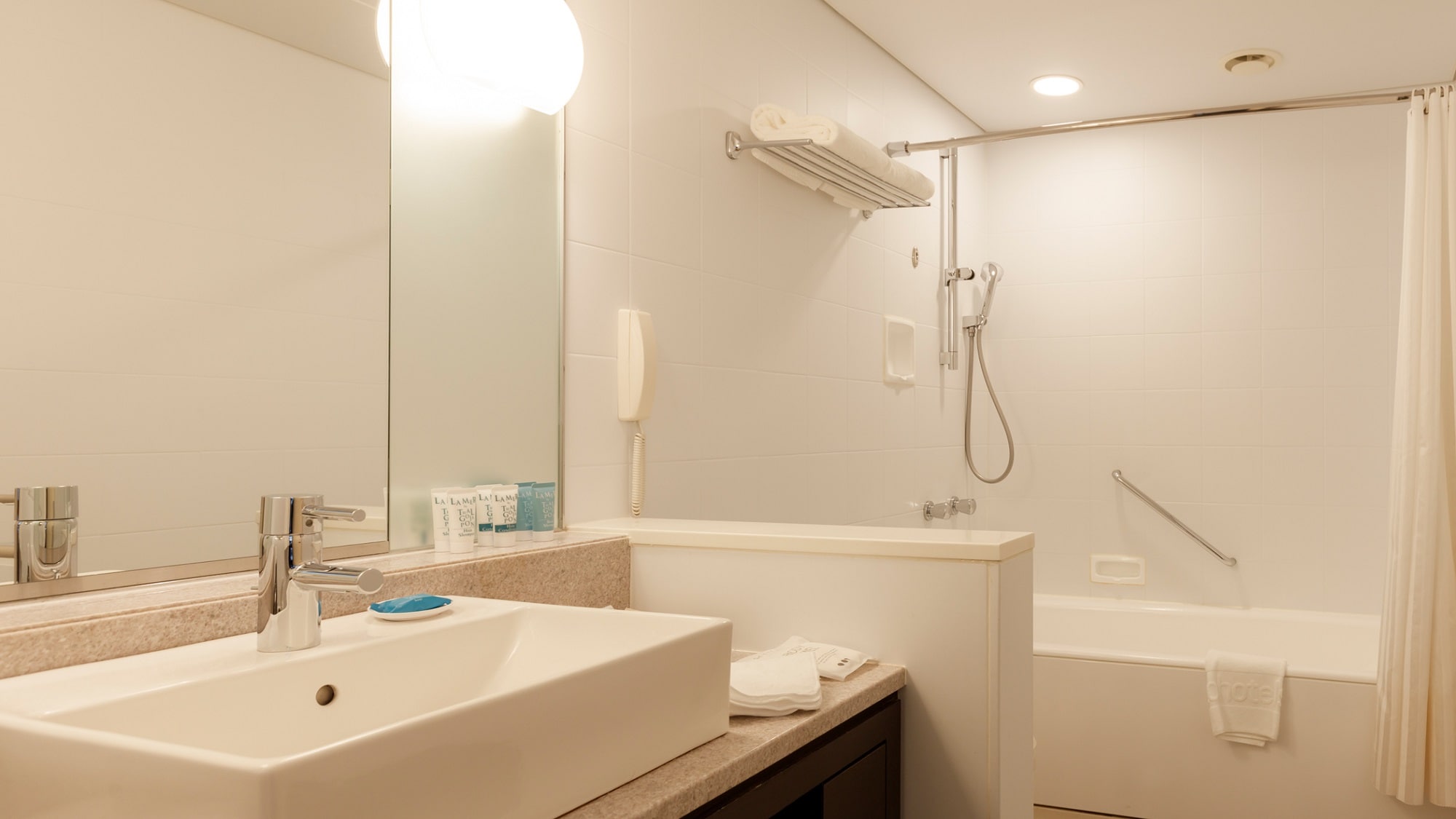 Example of stylish queen room/bathroom