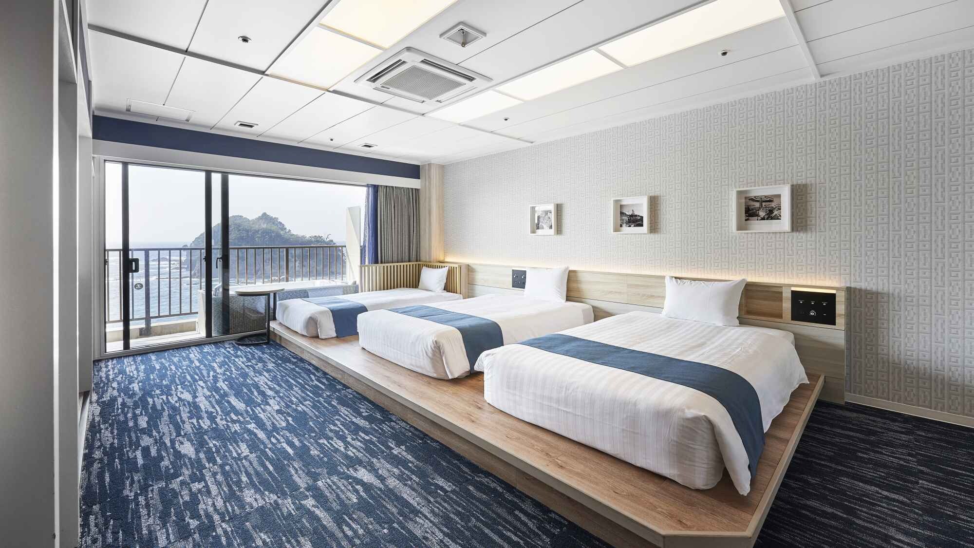 Kamar Twin Deluxe dengan Pemandangan Laut (dengan kamar mandi busa terbuka) untuk 1-4 orang
