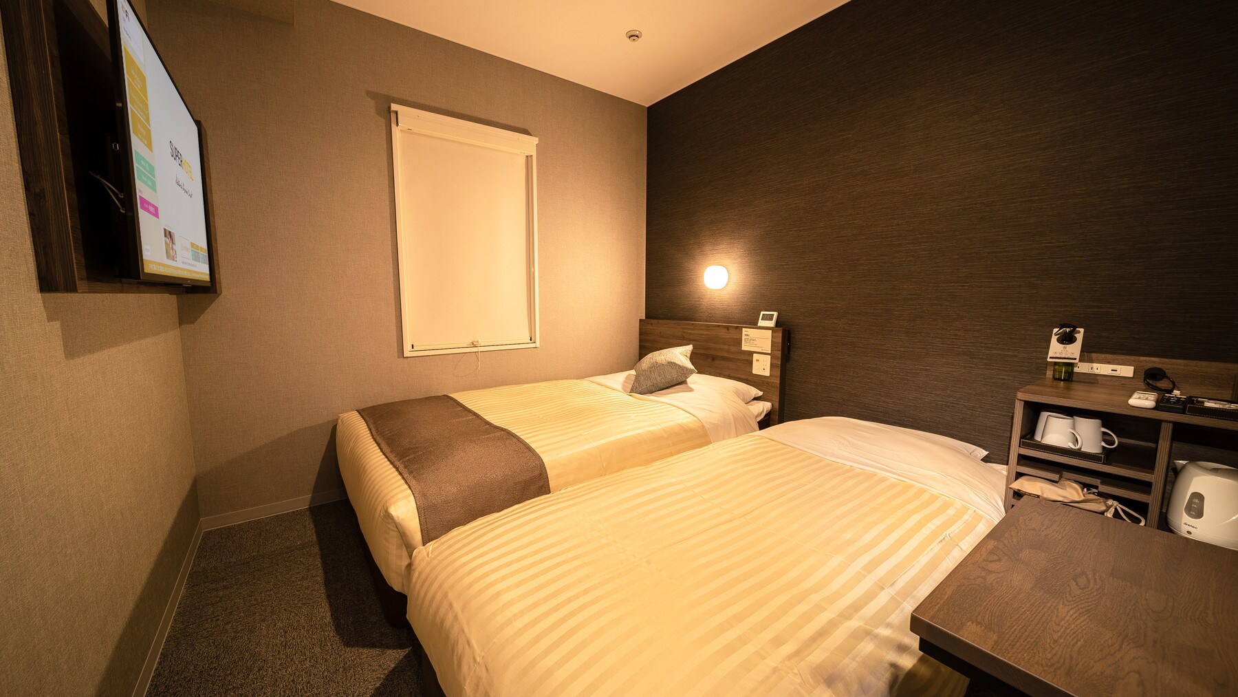 Enjoy a wonderful time in a twin room while chatting about your travel memories.