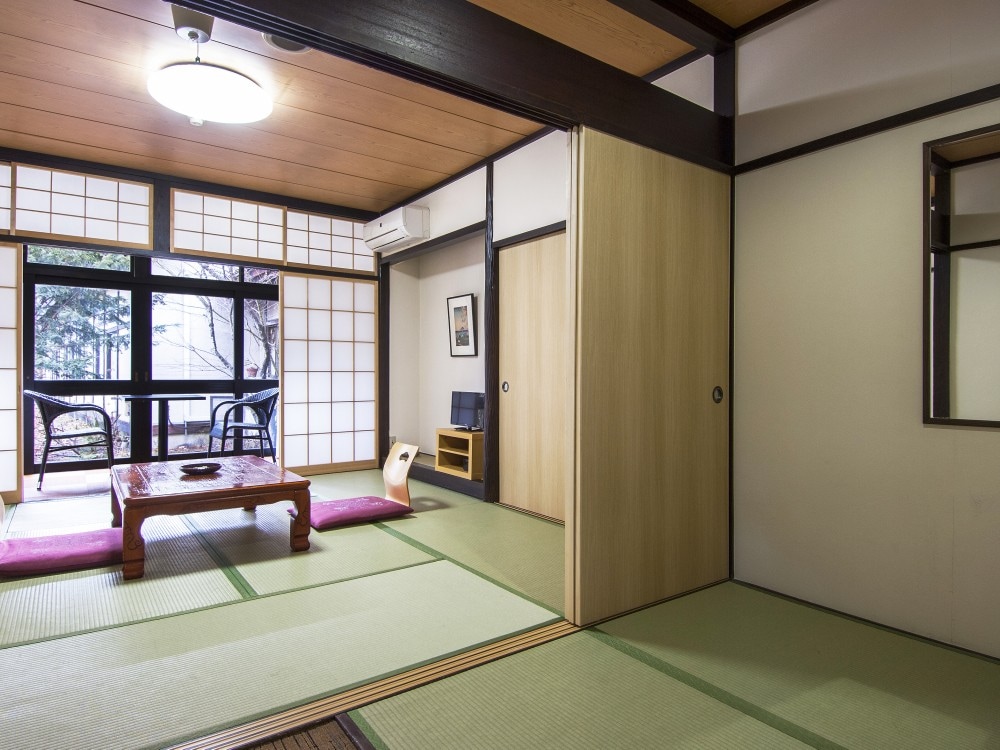 Japanese-style room (8 tatami mats) + veranda (3 tatami mats) (renovated/non-smoking room)