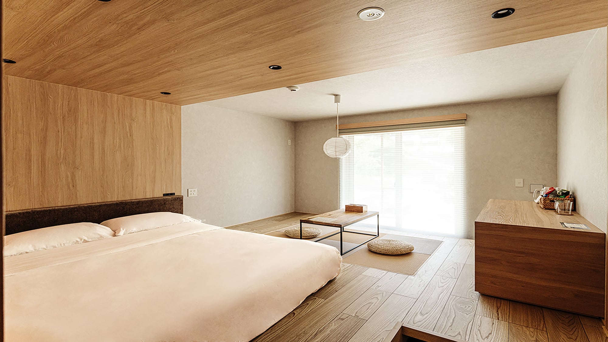 A standard double room with a comfortable, modern Japanese feel, made from natural materials.
