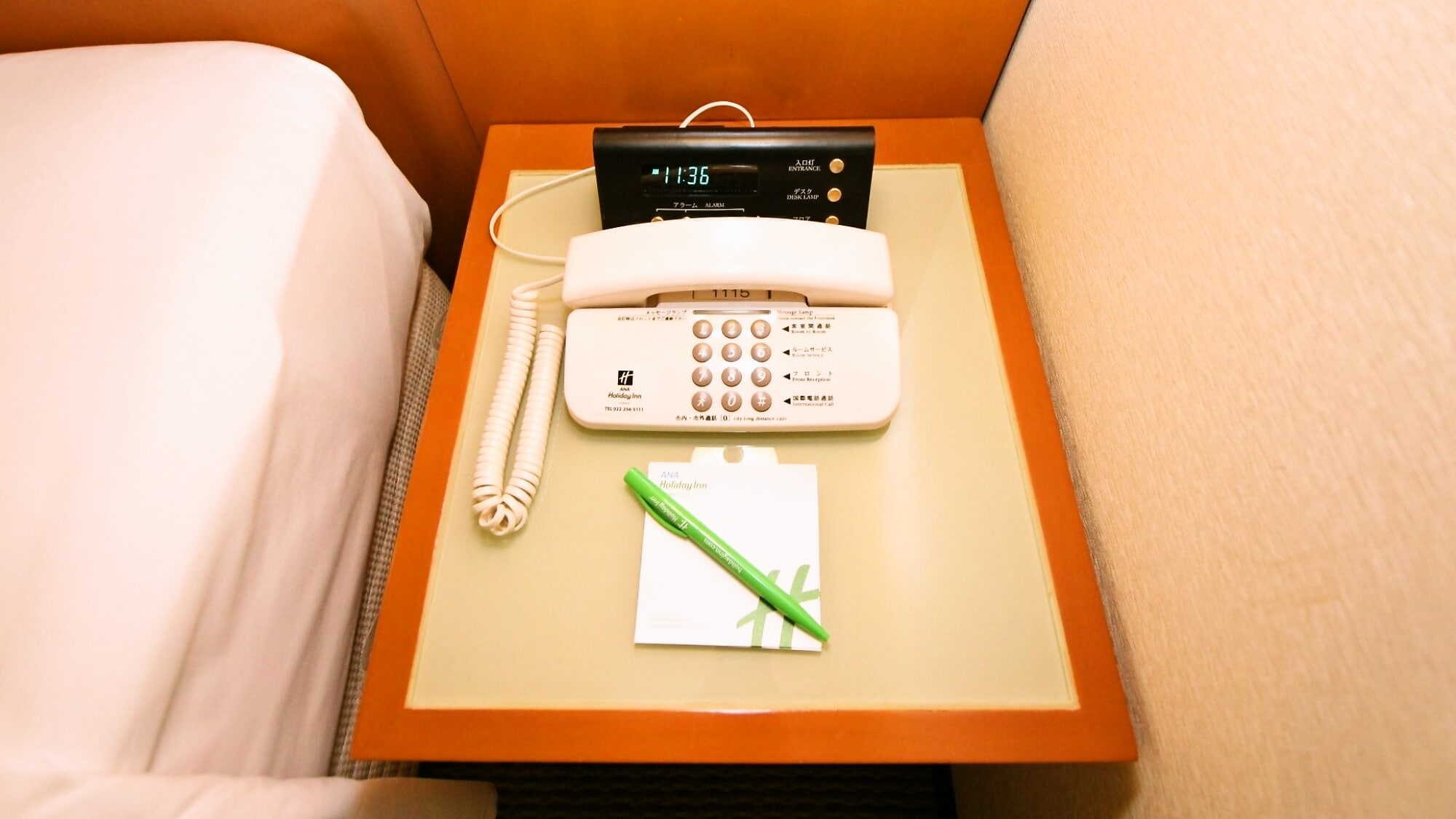 Bedside table *The digital clock has a switch for the room lights.