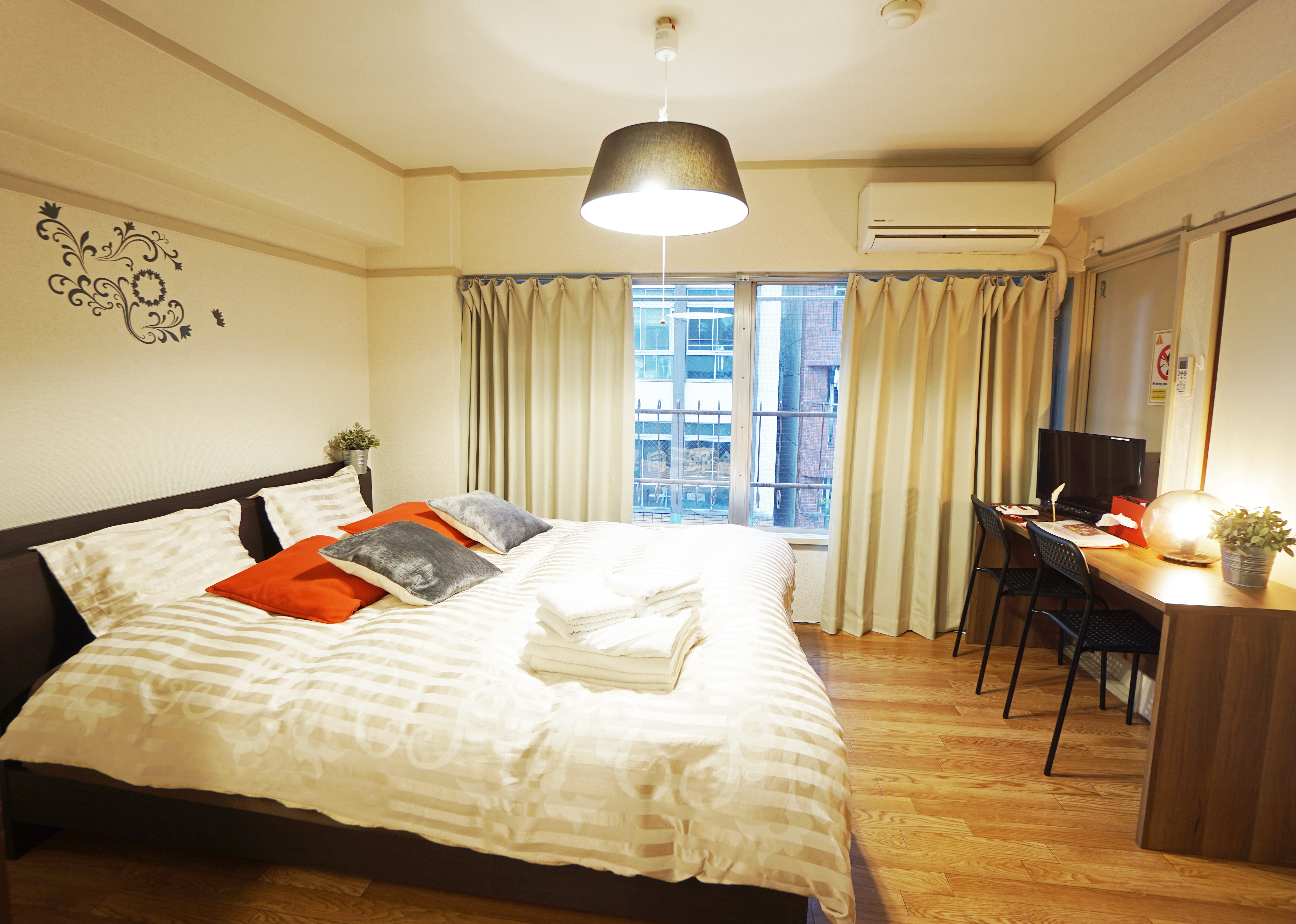 Spacious bedroom and convenient working desk