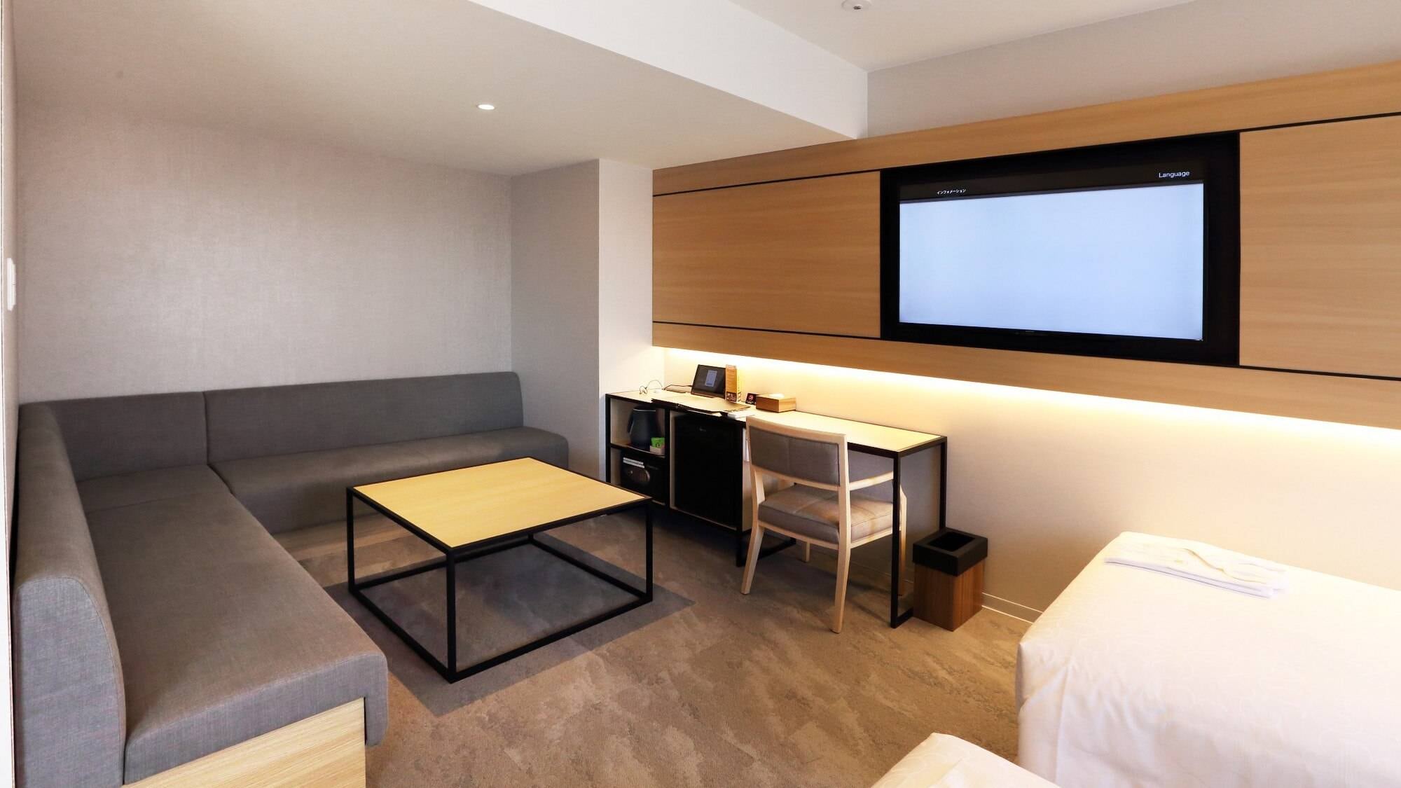 [Fourth Room] Relax on the spacious sofa available only in the Fourth Room.