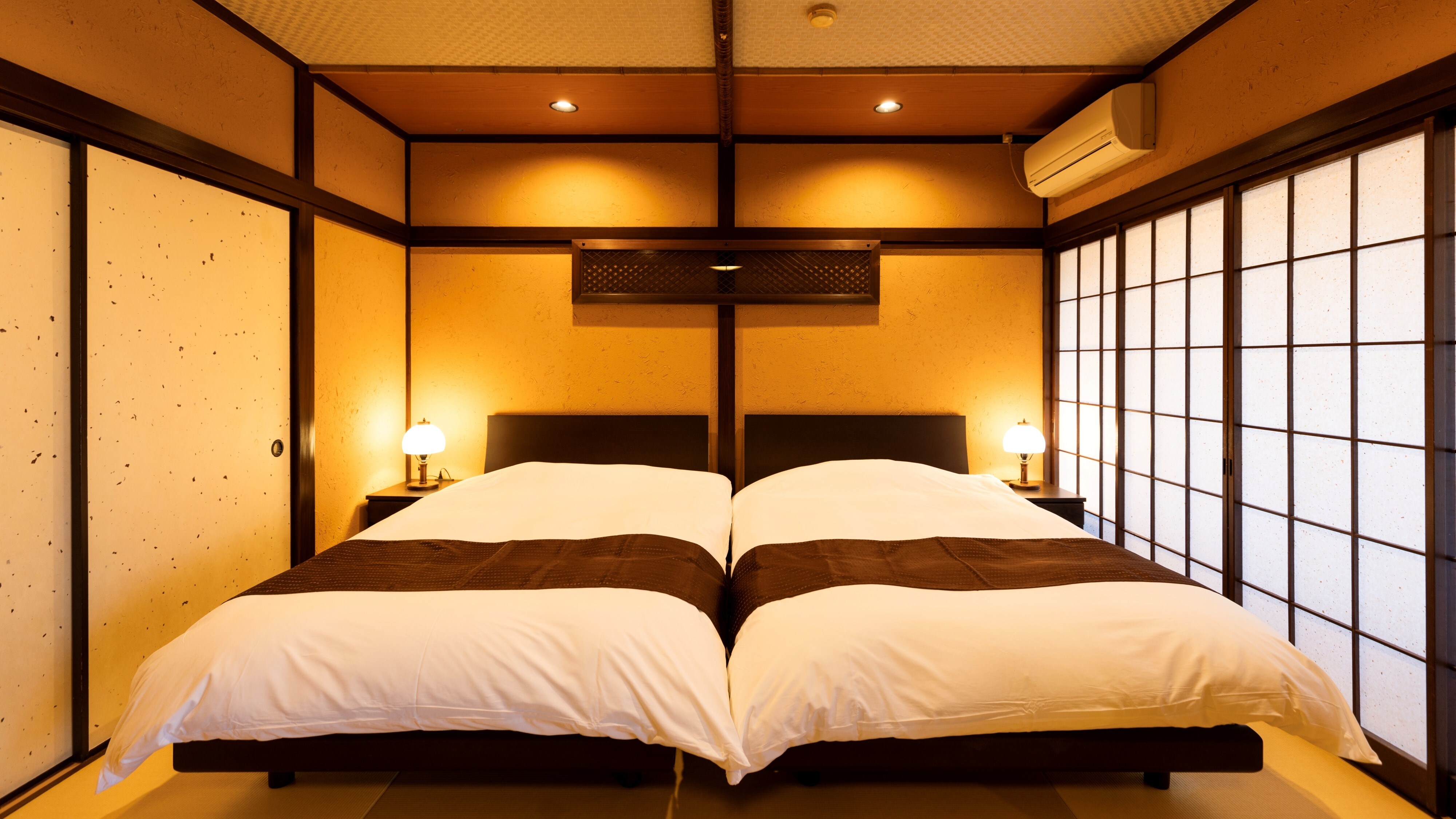 <Twin bed Japanese-Western style room> 8 tatami mat + 10 tatami mat room with spacious veranda [Non-smoking]