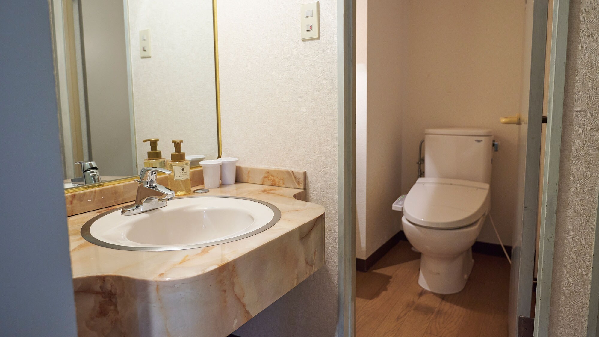 An example of a bathroom *The double and twin rooms have separate baths, sinks, and toilets.