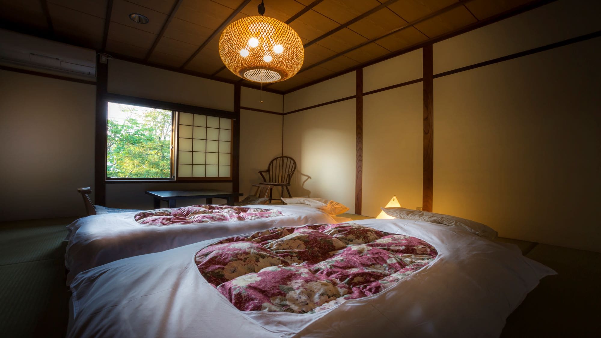 Maisonette style guest room with open-air bath, futon type