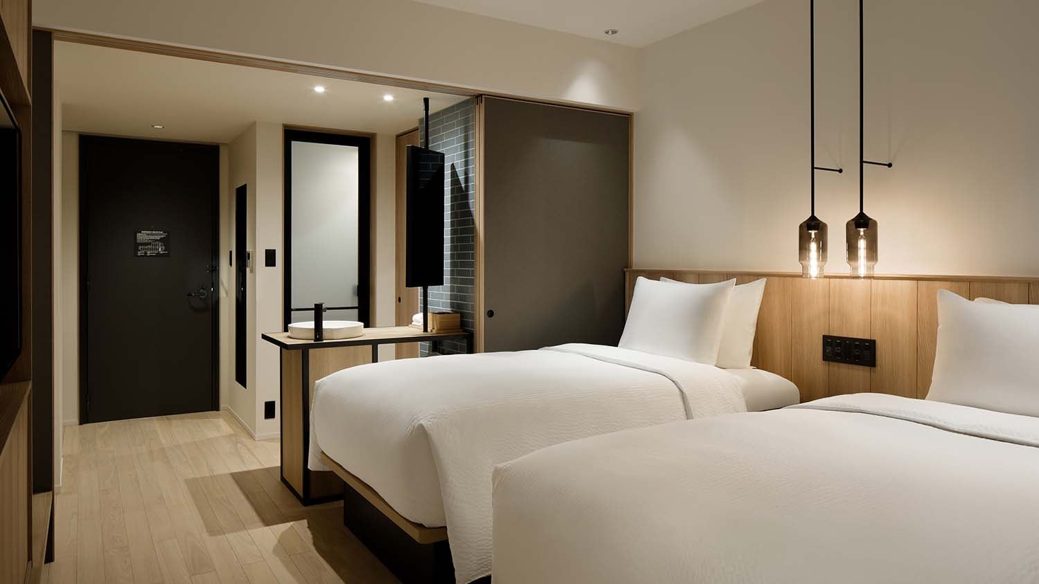 Twin room: 25 square meters, non-smoking, bed width 120 cm. Relax in a simple yet warm space.