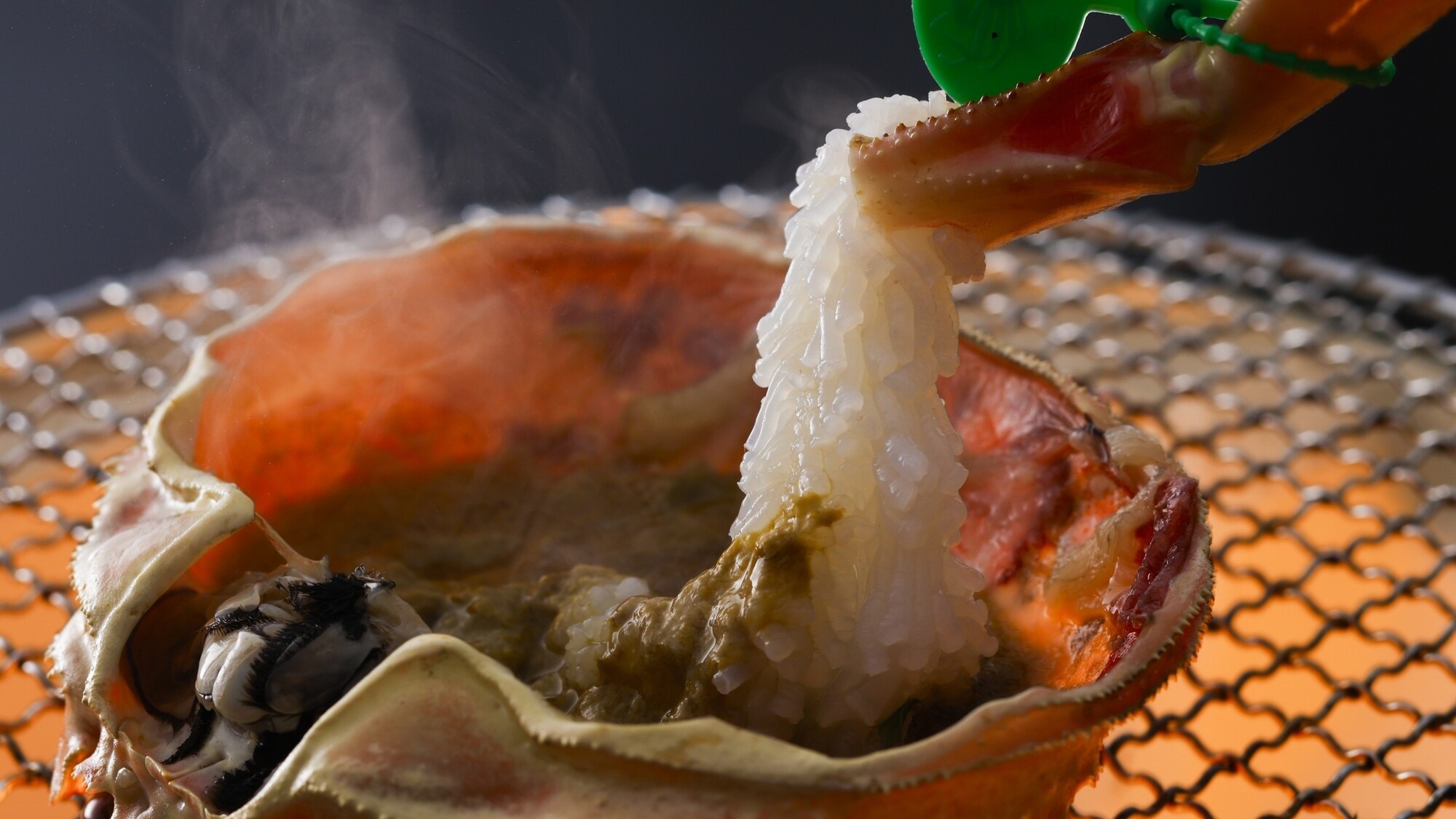 活蟹の炭火焼き／例