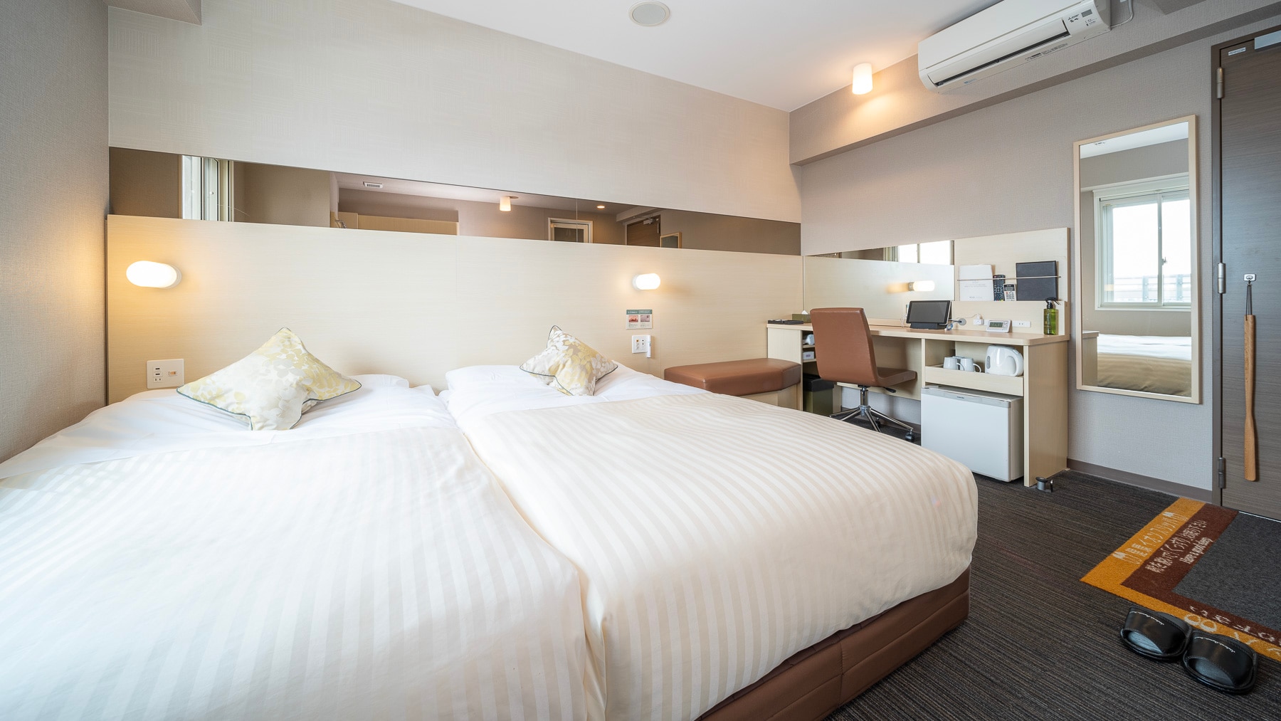 This room, with two semi-double beds, is recommended for families.