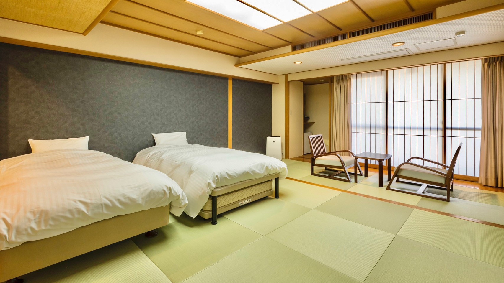 [Comfort * Bed] A room equipped with two single beds.