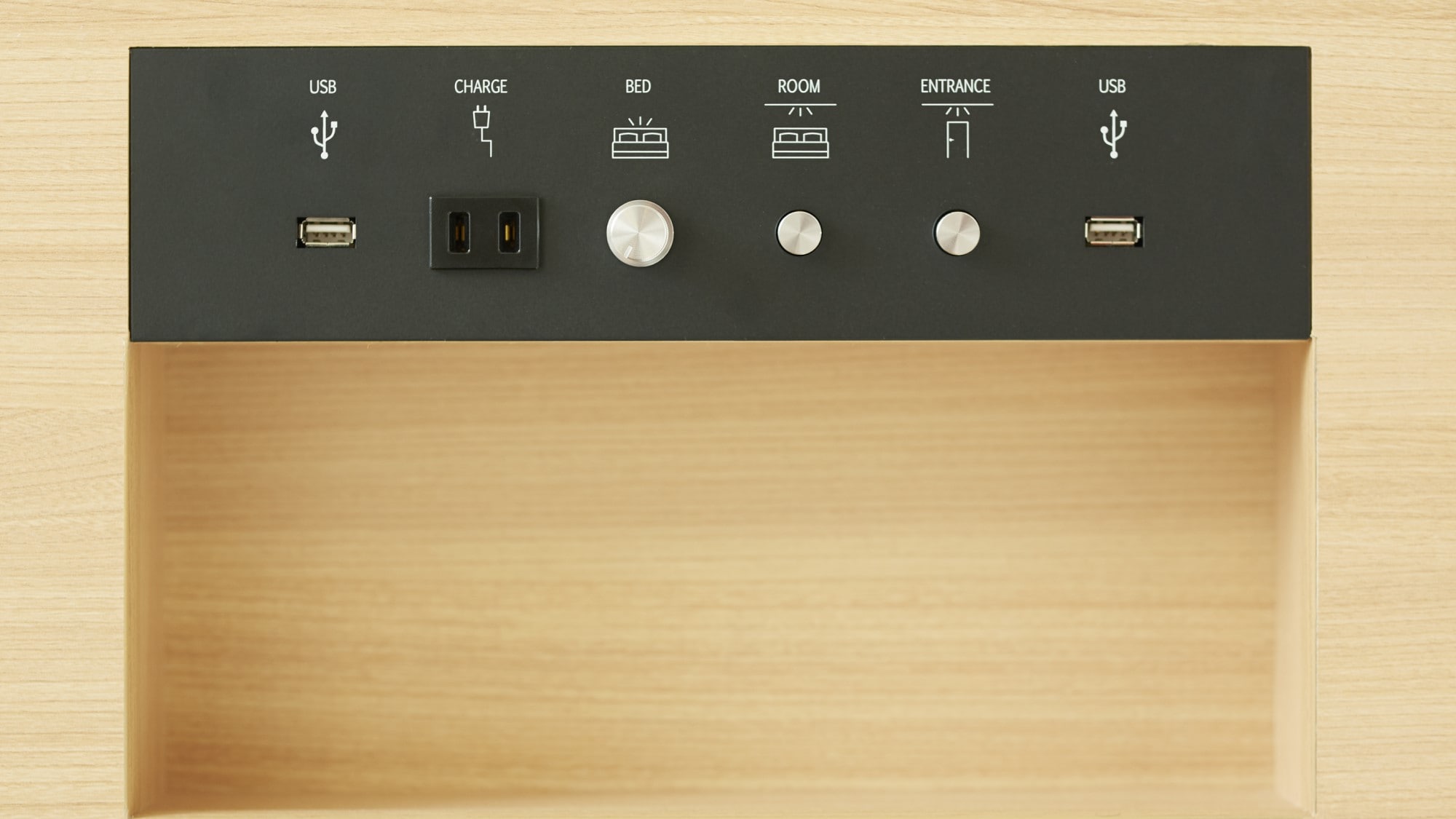 Each room is equipped with a convenient power outlet at the bedside.