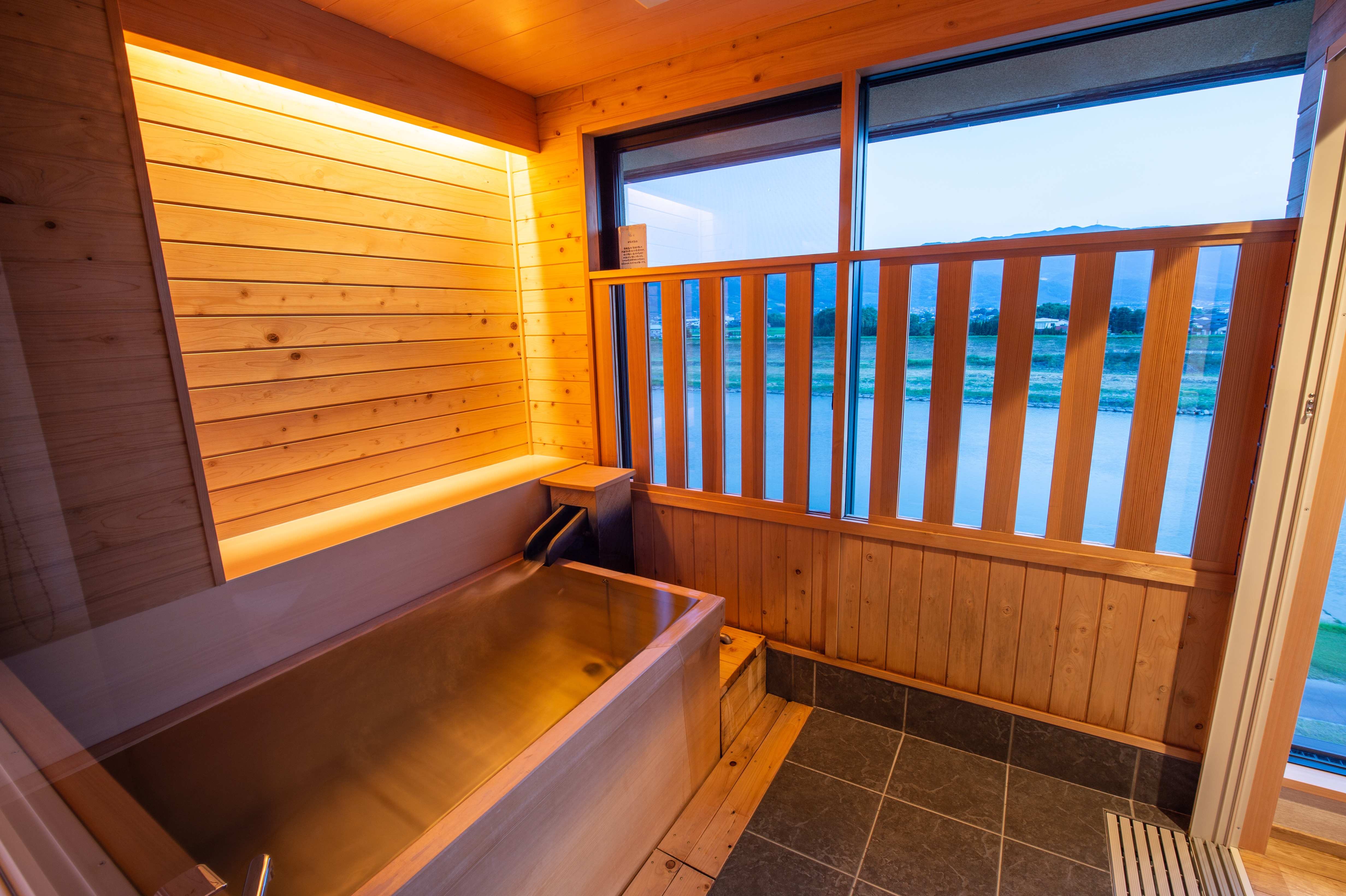 An example of an indoor bath in a river view suite