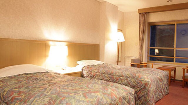 [Western-style room] A Western-style room equipped with a bed where you can have a good night's sleep.