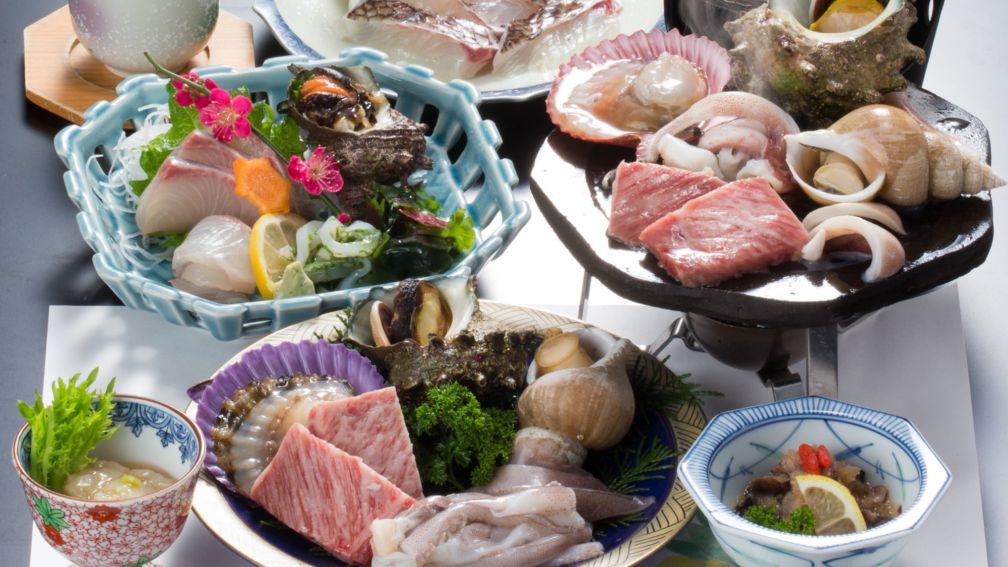 *■Oki Seafood Stone Grill (One Example)■Shimane Wagyu Beef, Clams, Turban Shells, and more!