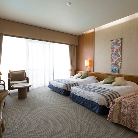 The extra bed can accommodate up to 3 people (Ocean Twin / Garden Twin / Suite)