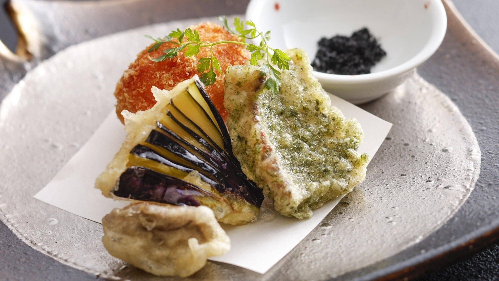 Plum croquettes and deep-fried hairtail fish with Kishu binchotan charcoal salt.