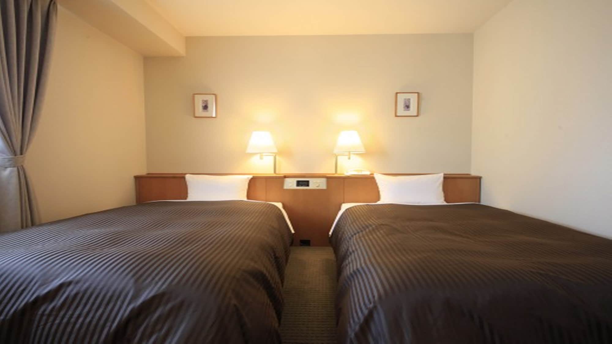 Tempat tidur kamar twin deluxe