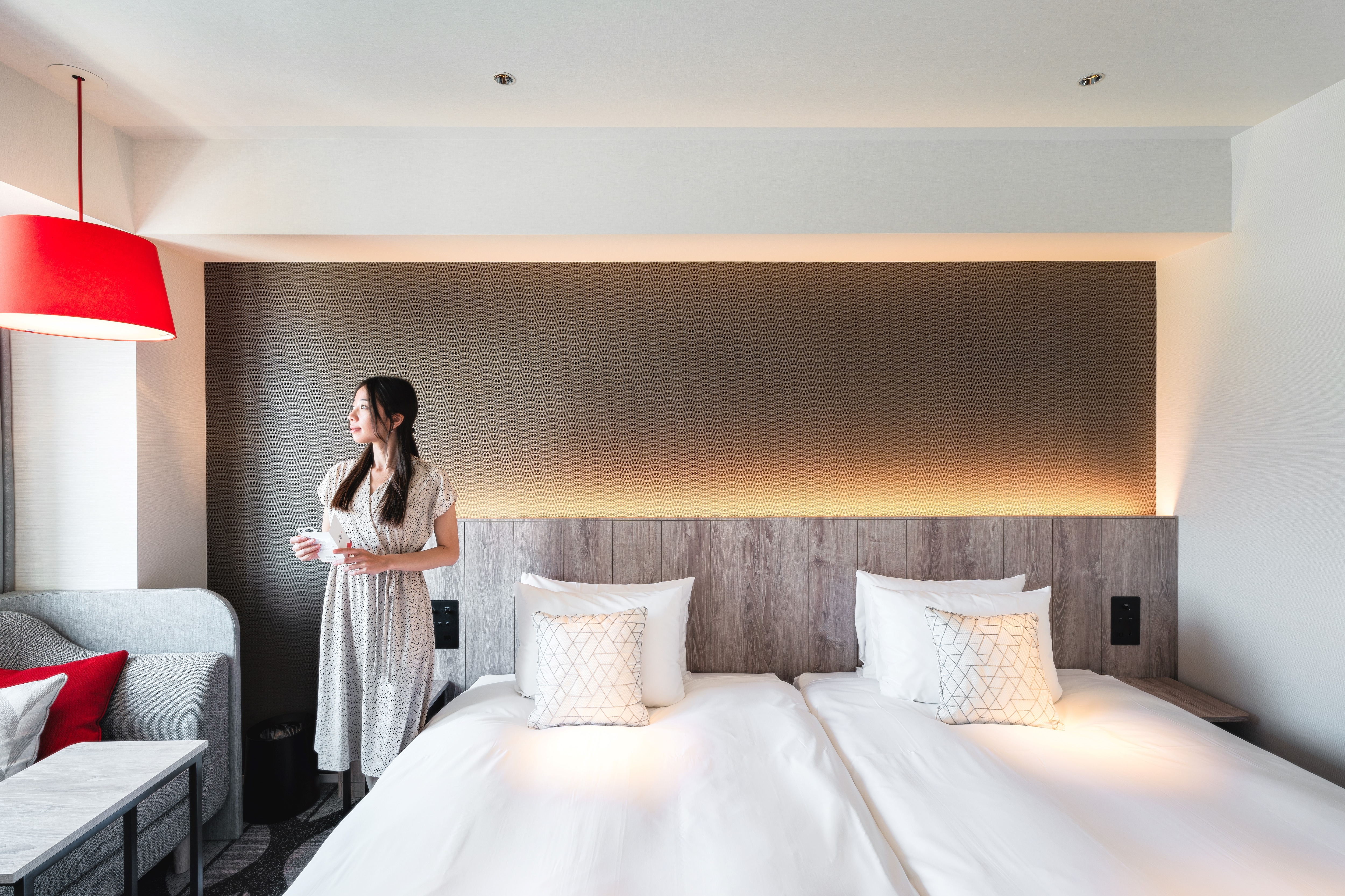 Features a red pendant light