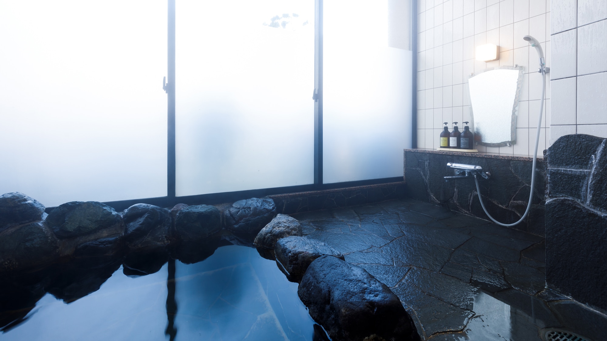 Guest room with hot spring rock bath (garden side) Spacious bathroom.