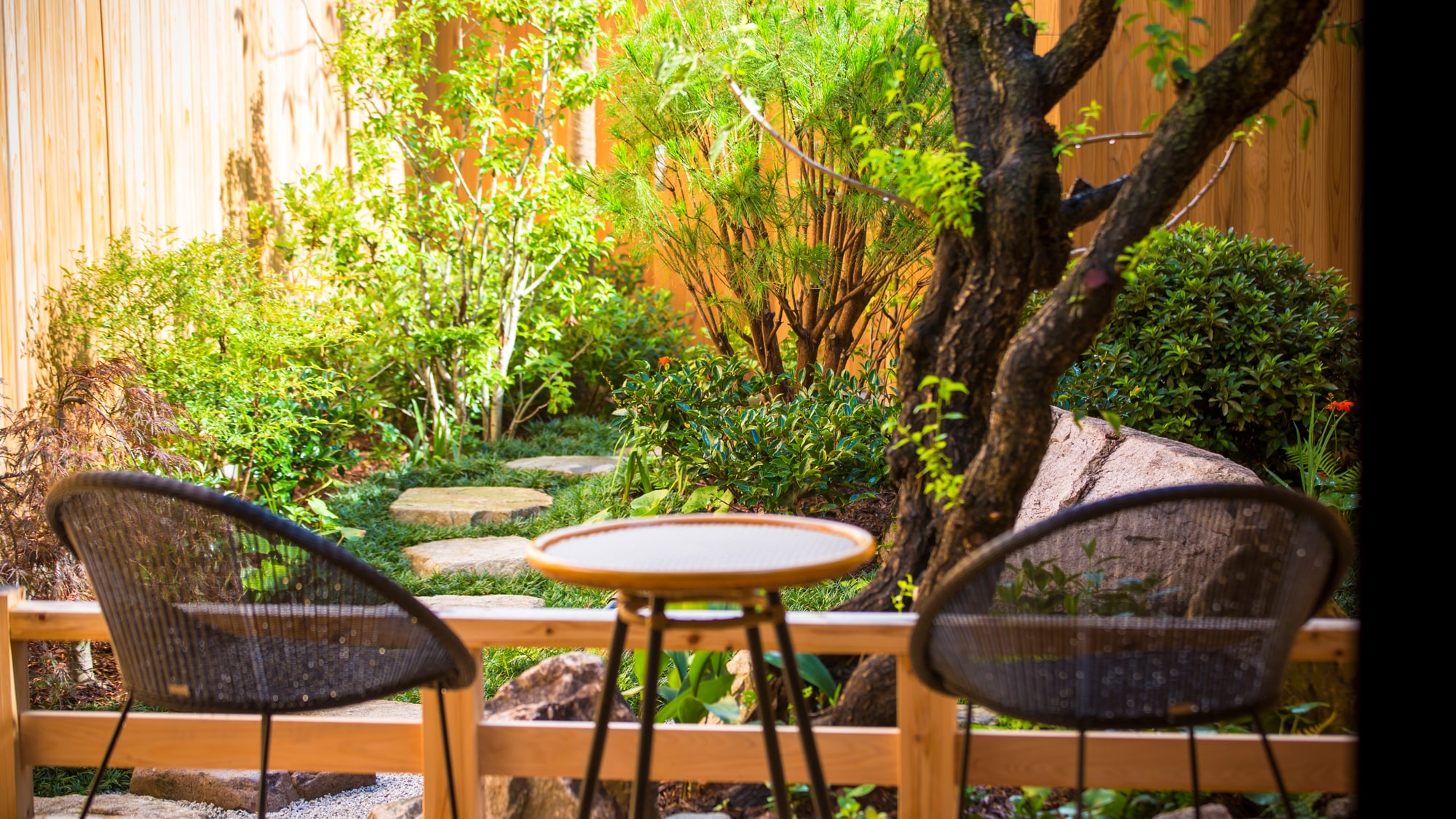 On the veranda-style terrace, you can enjoy the cool evening air after a bath, a cup of coffee under the moonlight, or simply sip your morning coffee (Building A).