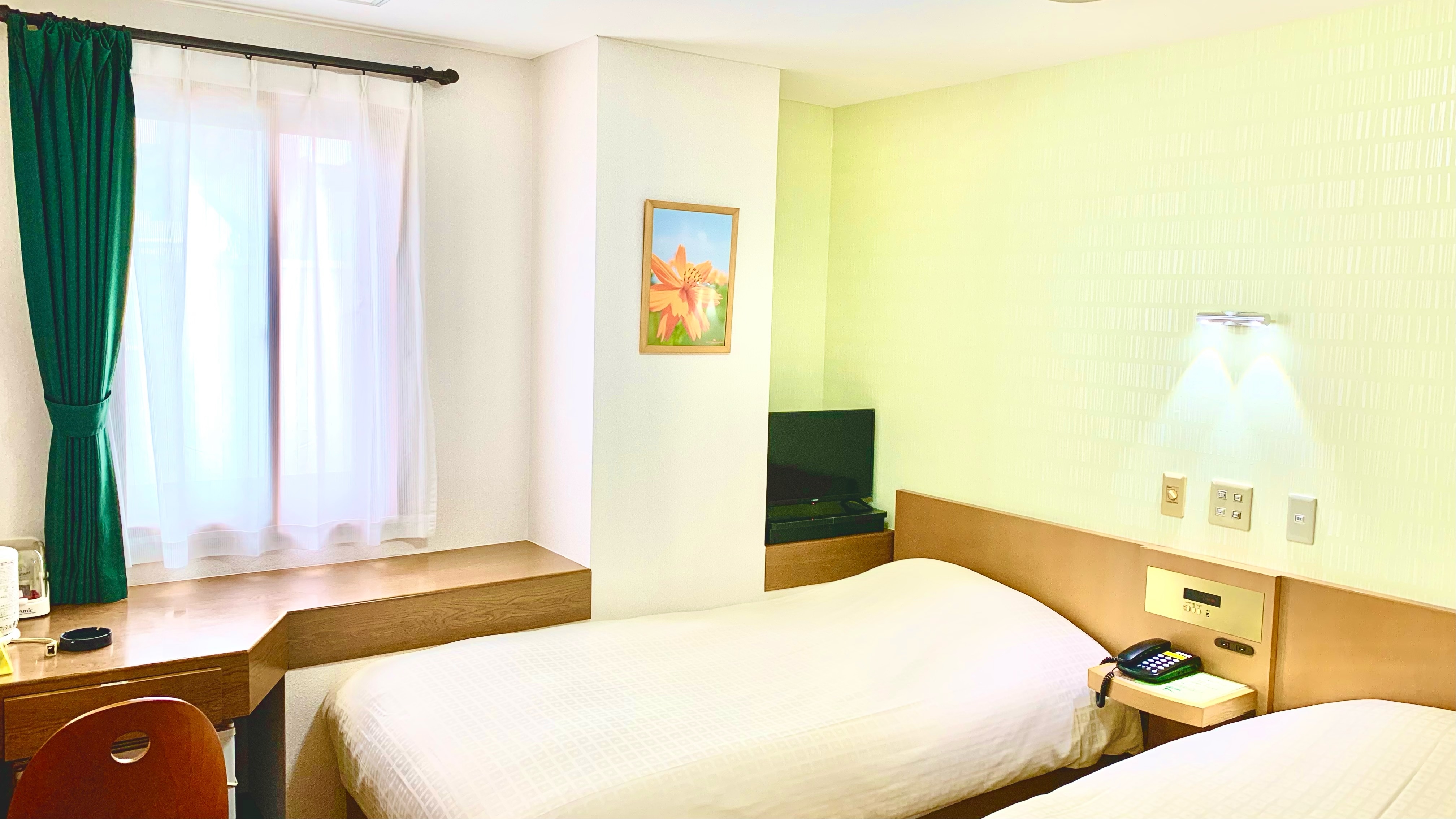 This is an example of the renovated Twin Room A smoking room.