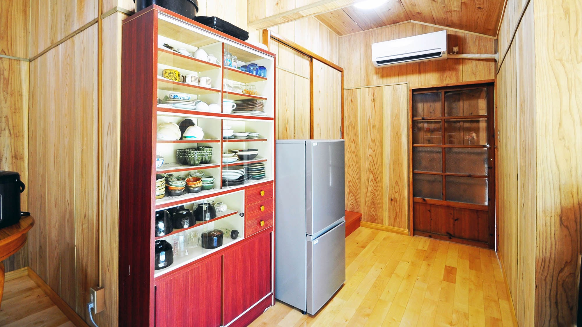 [Kitchen] There is also a refrigerator and cupboard so you can prepare your own meals.