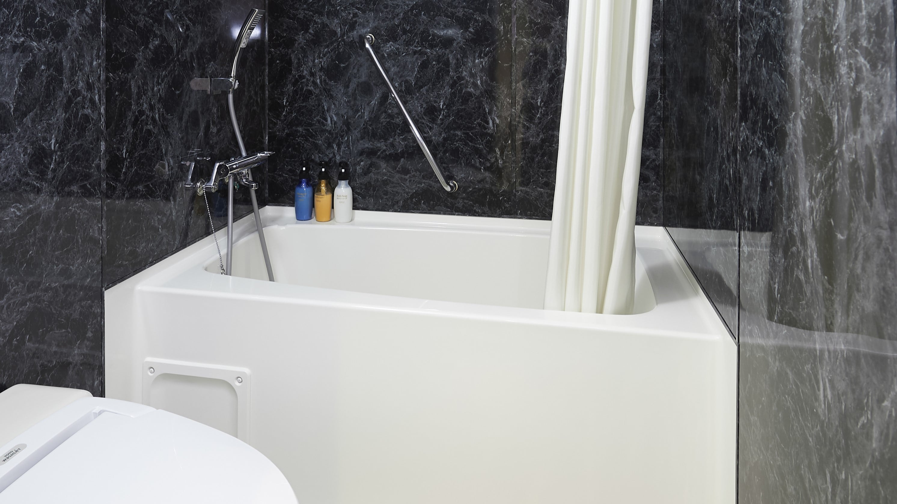 Family room bathroom and toilet (example of a guest room)