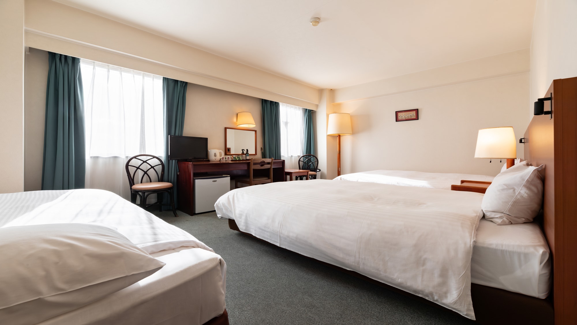 Triple room (2 semi-double beds, 1 extra bed)
