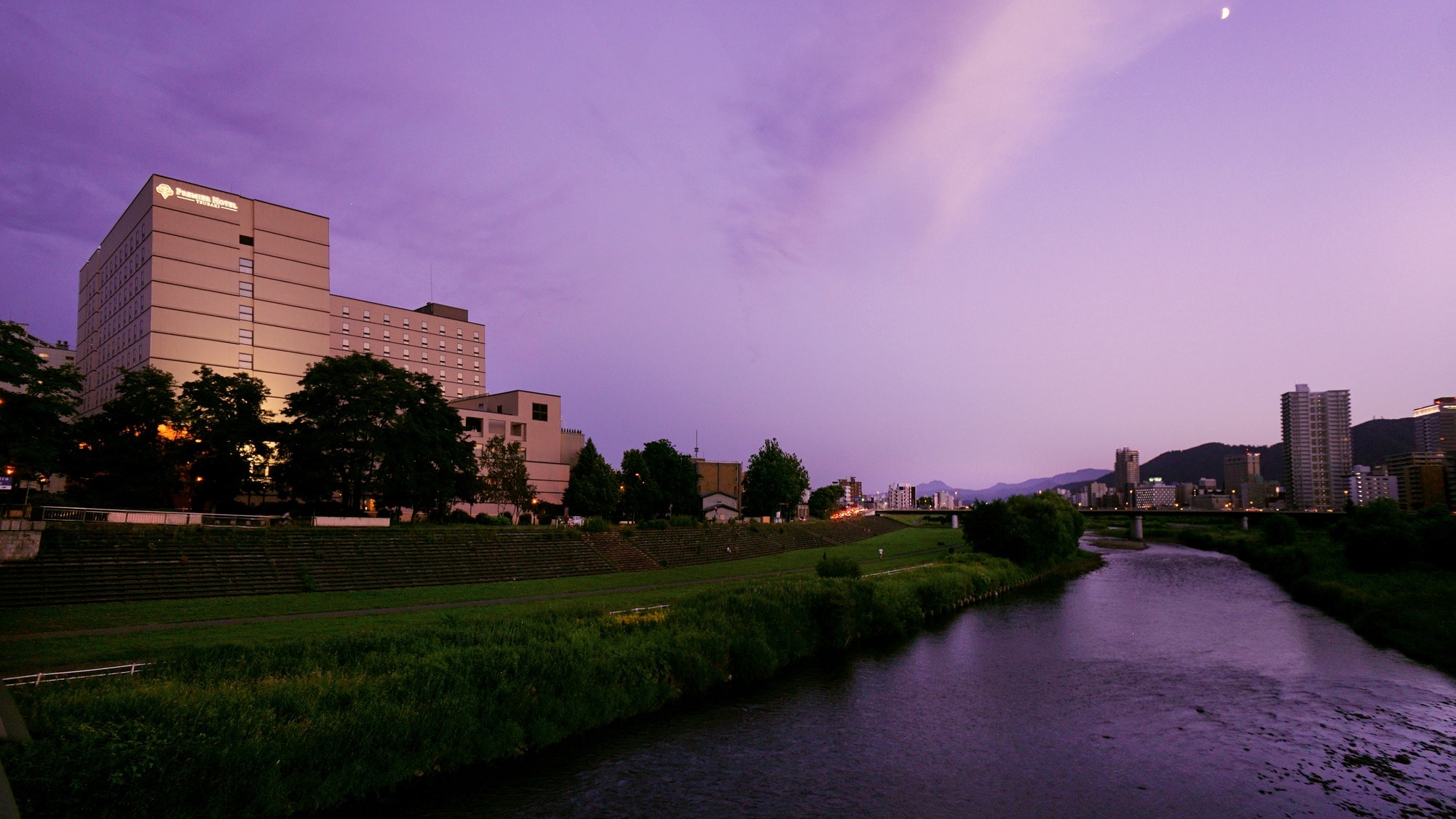 Hotel exterior dyed in lilac at a special time in the evening
