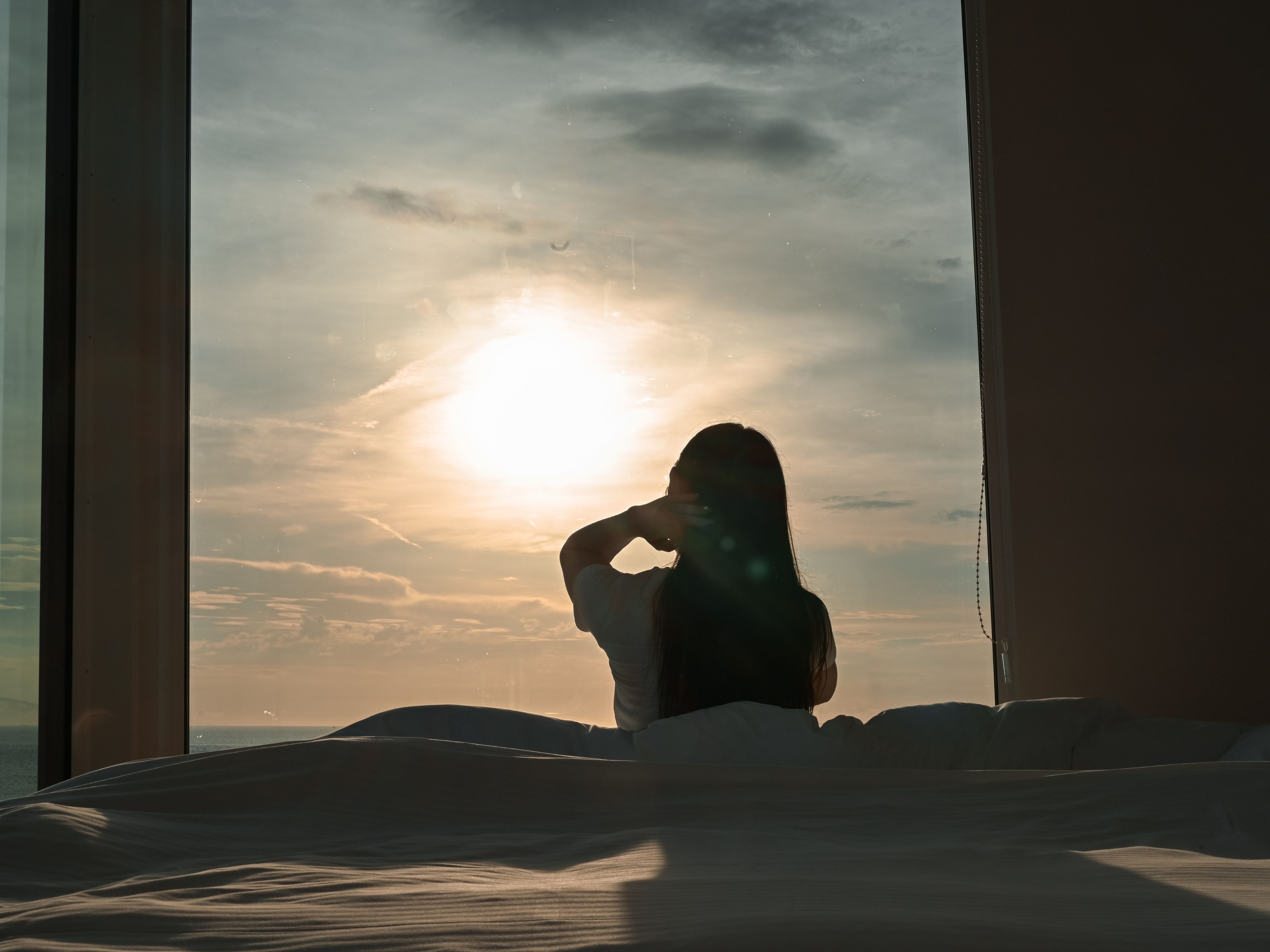 Bedroom with a sunset view