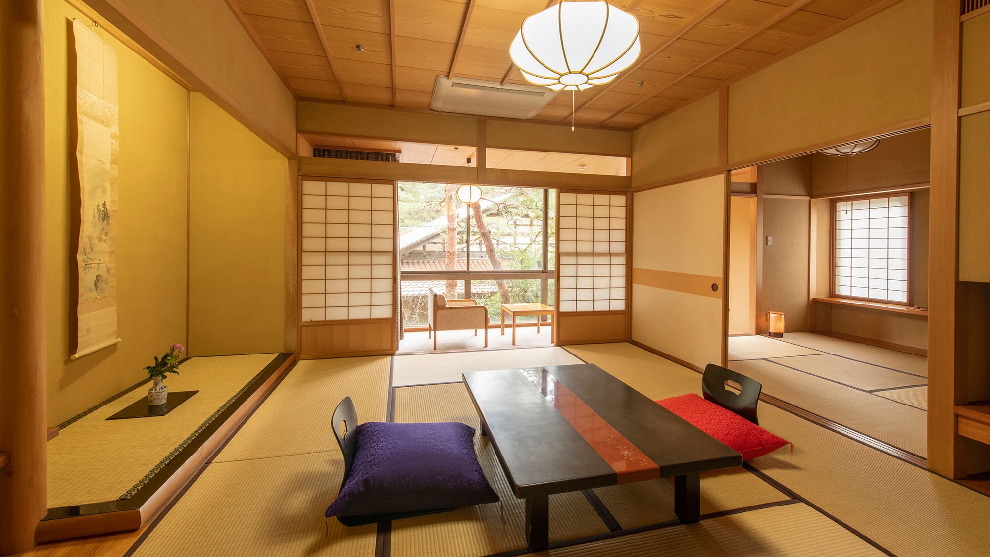 [Choyo Room: Two-story suite] An upper-floor room overlooking the garden from the window.