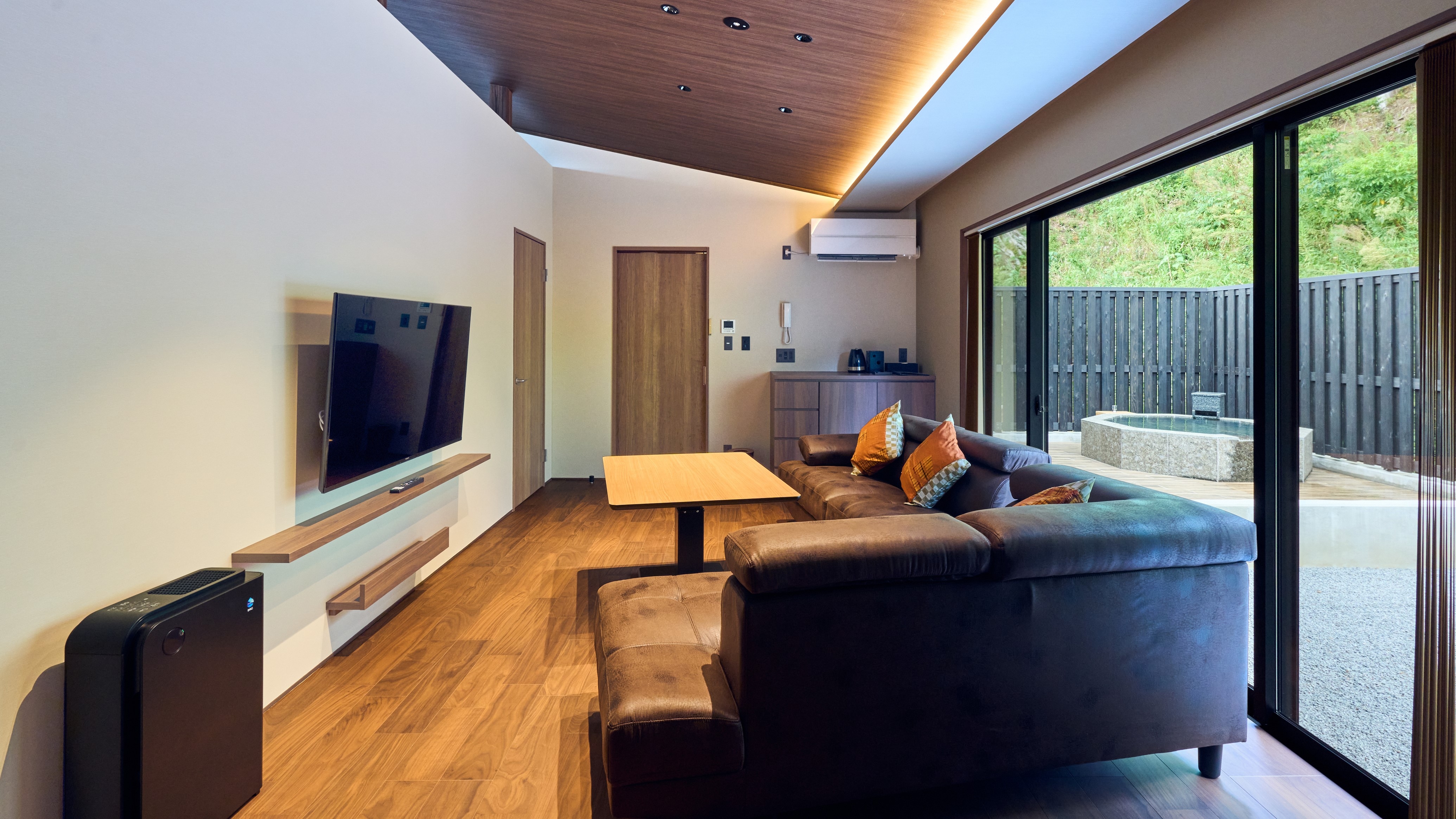 Japanese-Western style room with open-air stone bath