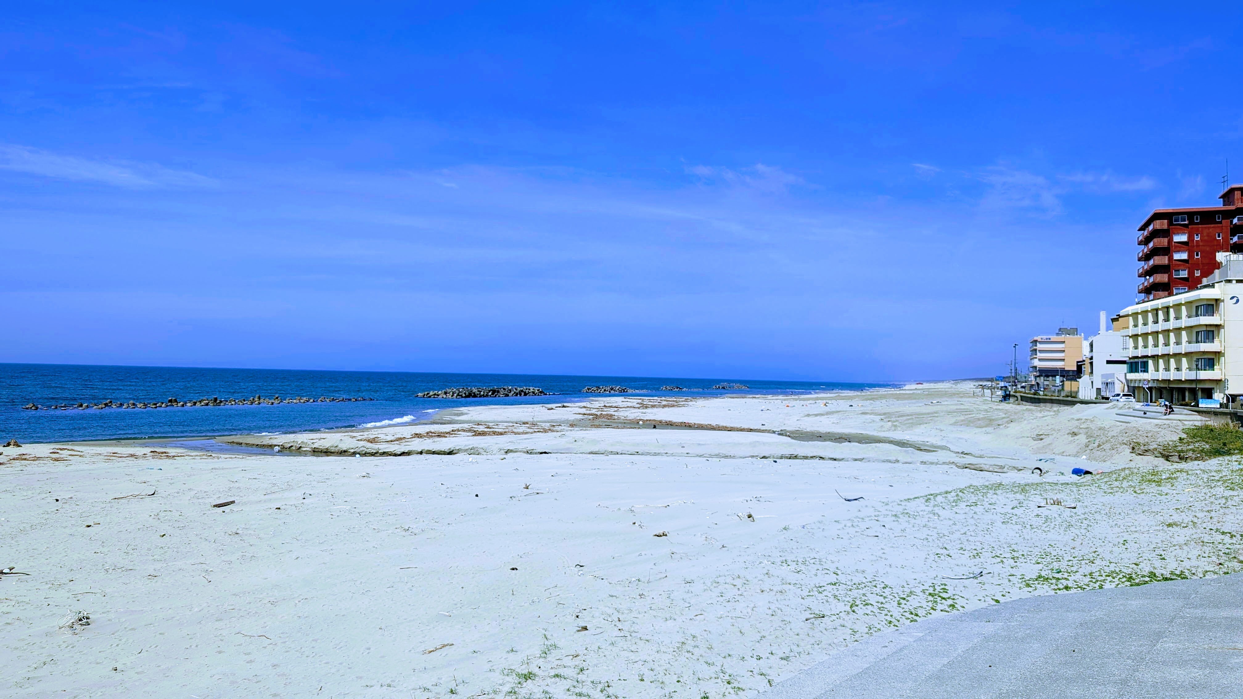 The sandy beach is just a few seconds walk away.