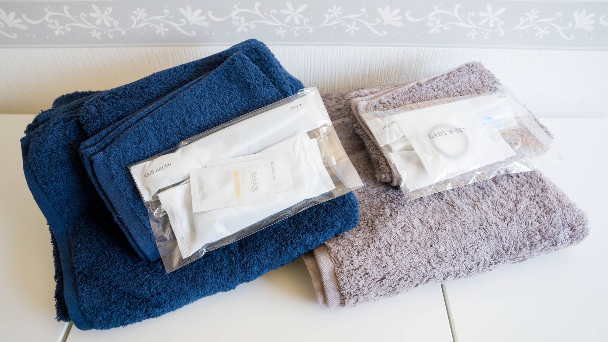 Amenities and towels are provided.