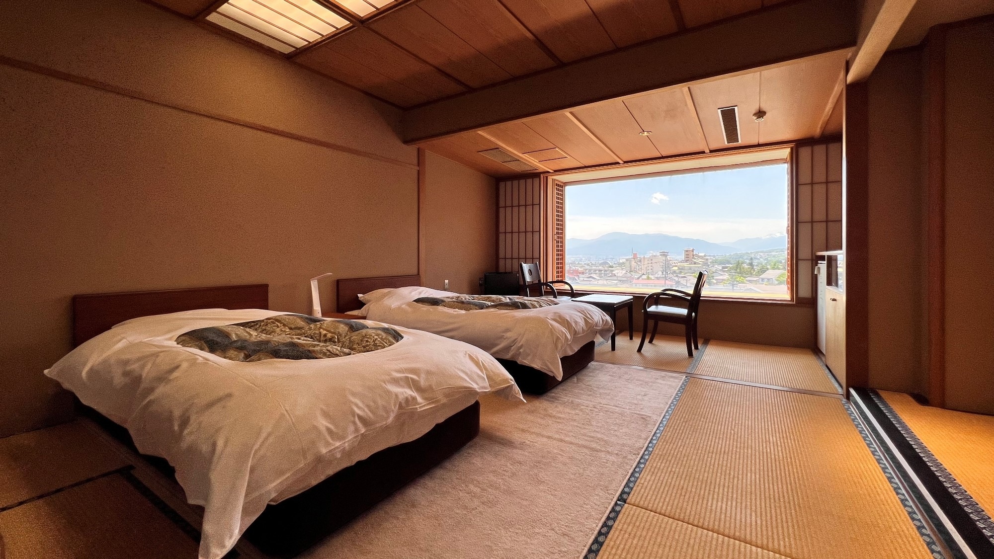 Only one room available: Twin room with a view of the Northern Alps